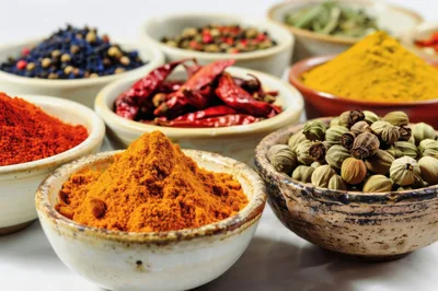 Assorted Spices In Small Ceramic Bowls