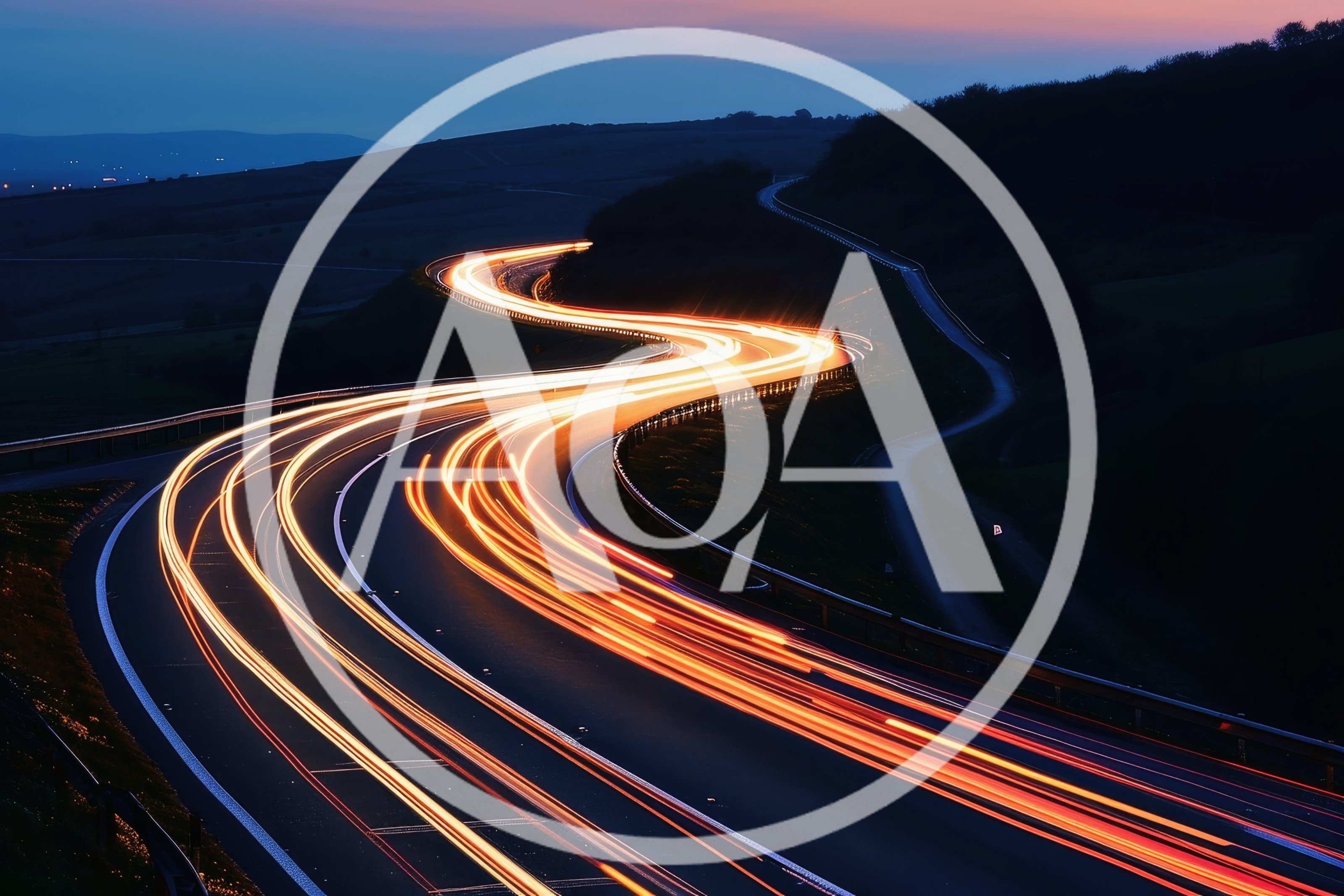 Long Exposure Light Trails On A Winding Highway