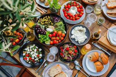Mediterranean Brunch Spread On A Rustic Wooden Table