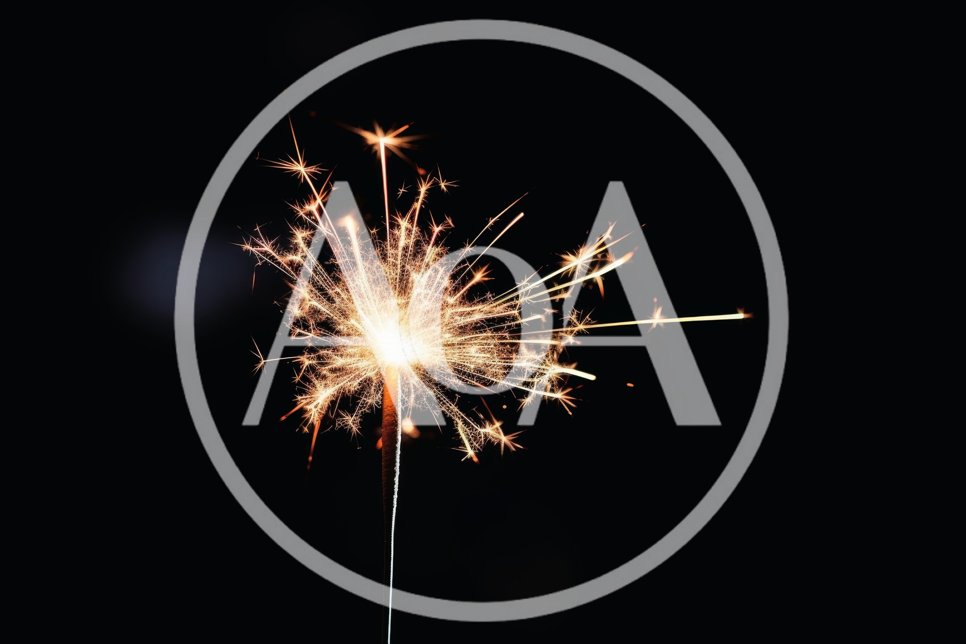 Sparkler Burning Brightly Against A Dark Background