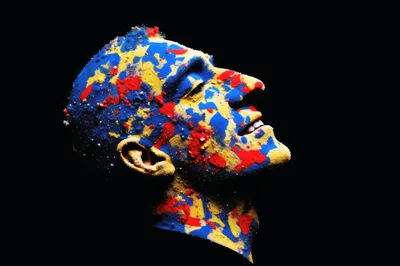Profile Of A Man Covered In Colorful Powder