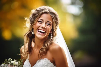Radiant Bride Laughing Outdoors In Wedding Dress