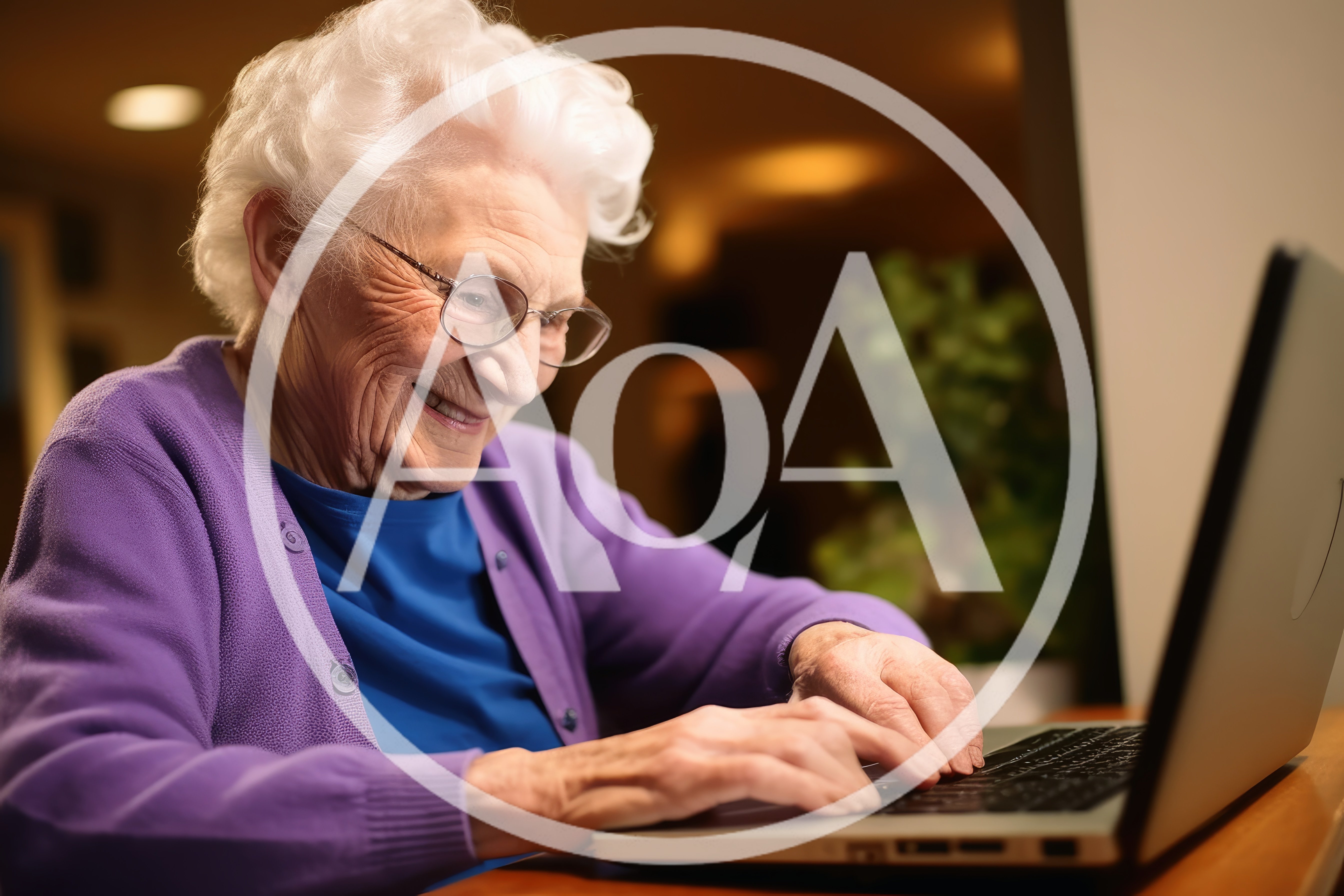 Elderly Woman Smiling While Using A Laptop Computer