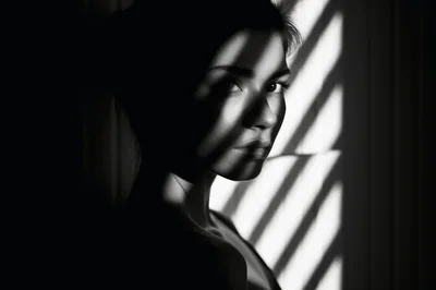 Portrait Of A Woman With Dramatic Shadow Lighting