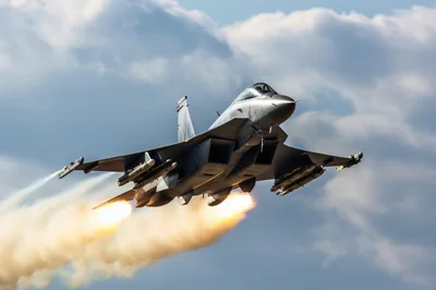 Fighter Jet Performing High Speed Afterburner Takeoff