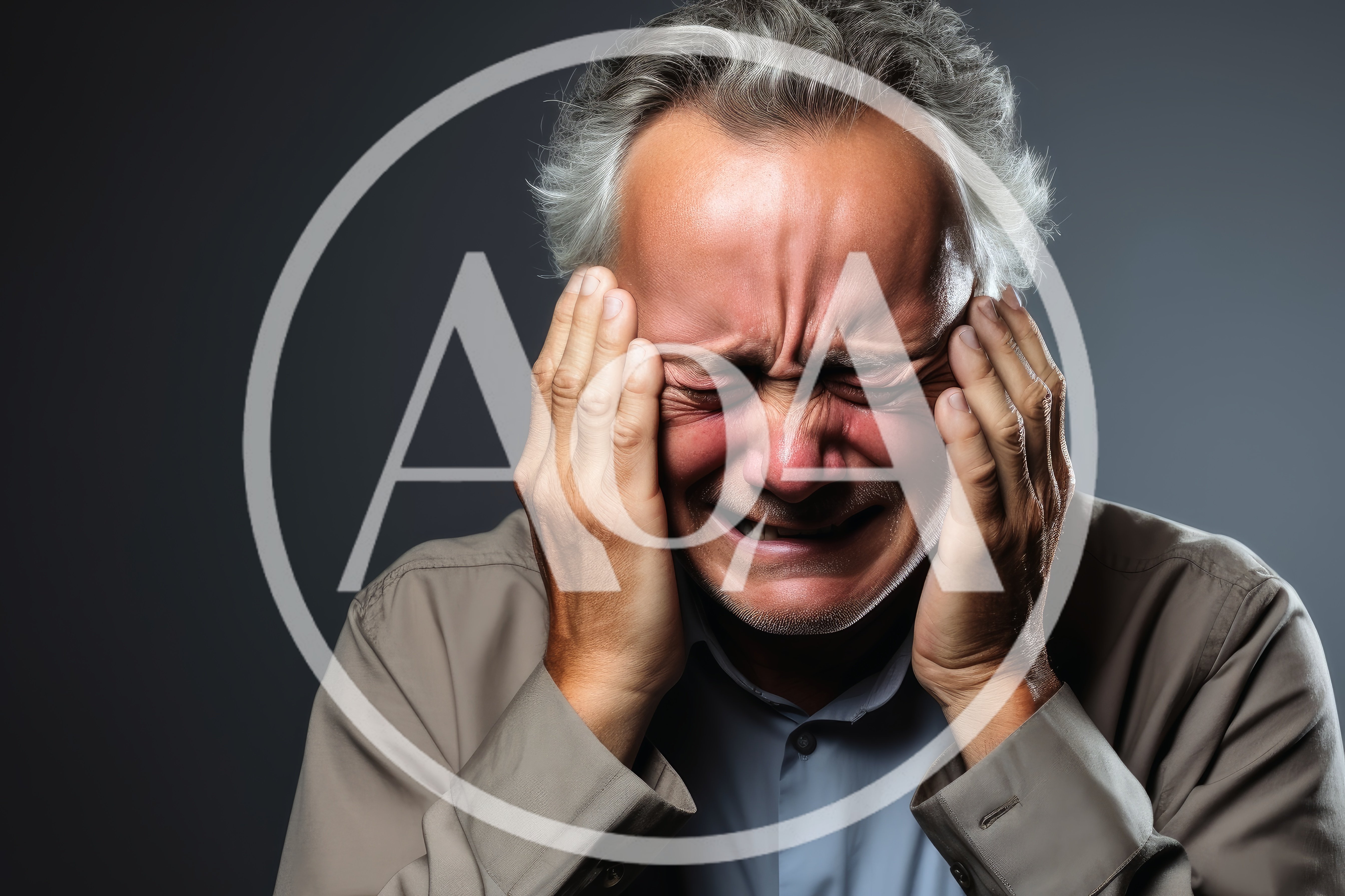 Distressed Mature Man Holding Head In Pain