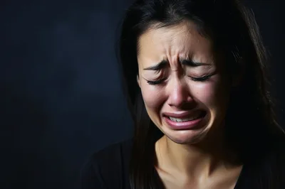 Young Woman Crying With Intense Emotional Expression
