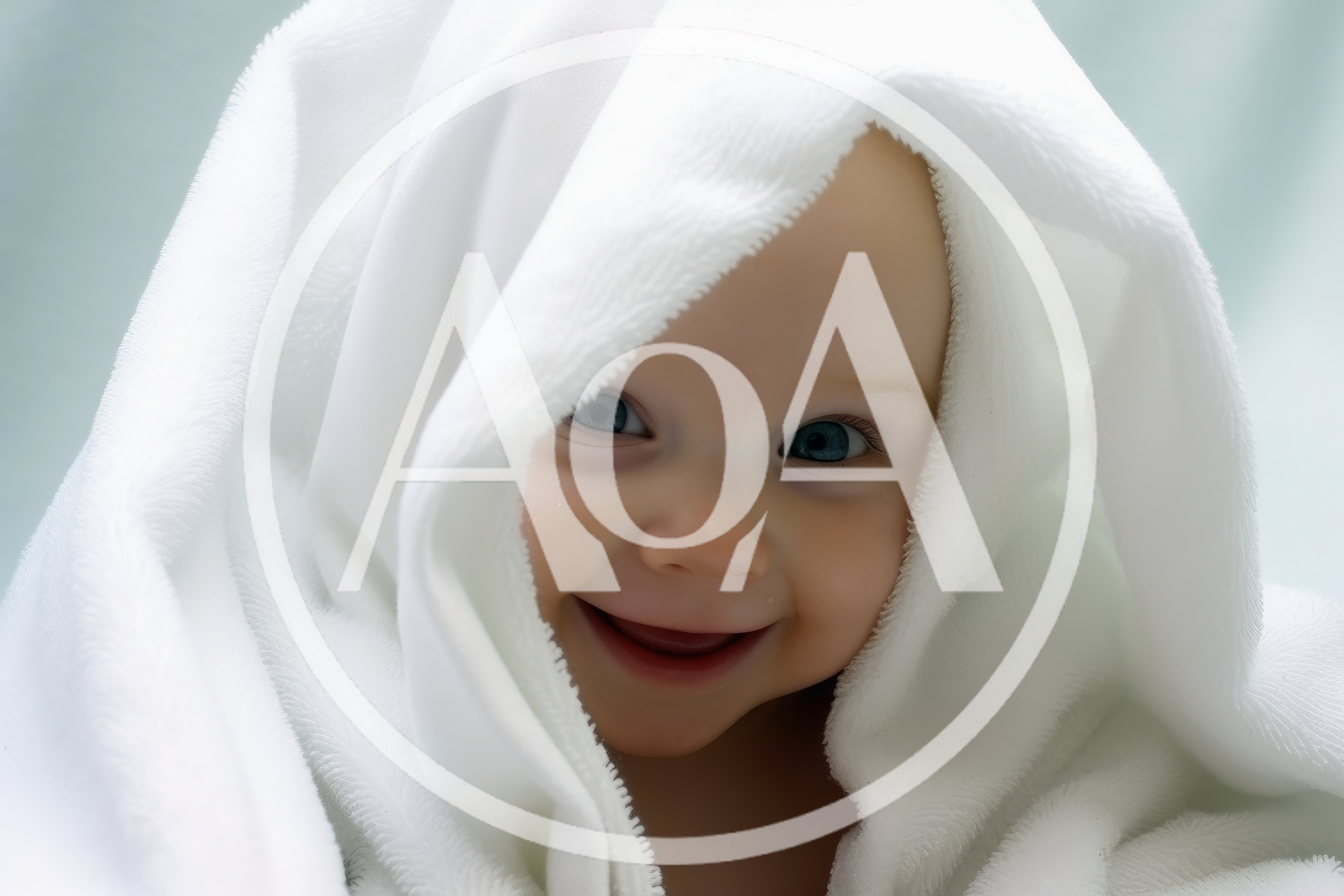 Happy Baby Wrapped In A Soft White Towel