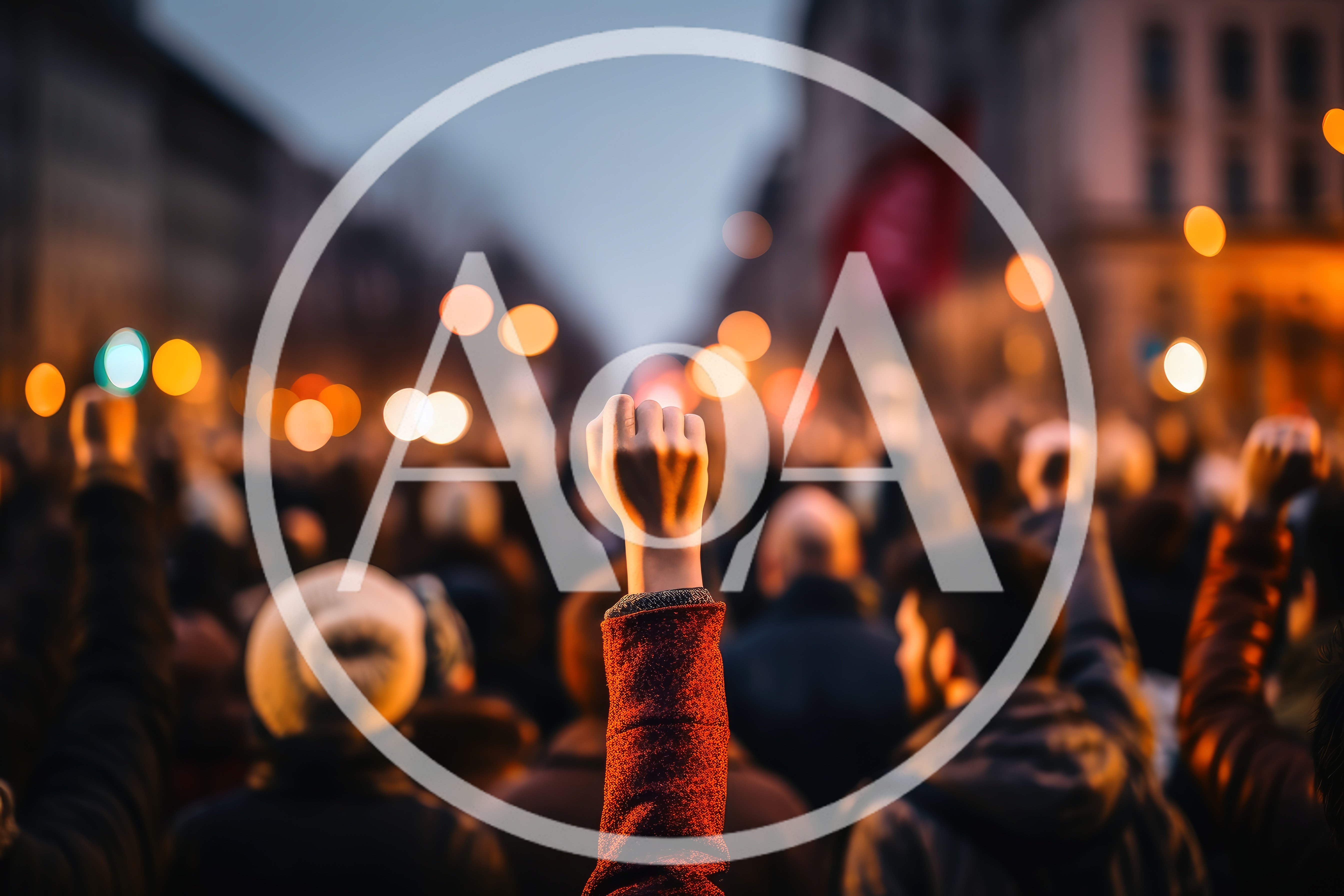 Protesters Raising Fists During A Public Demonstration