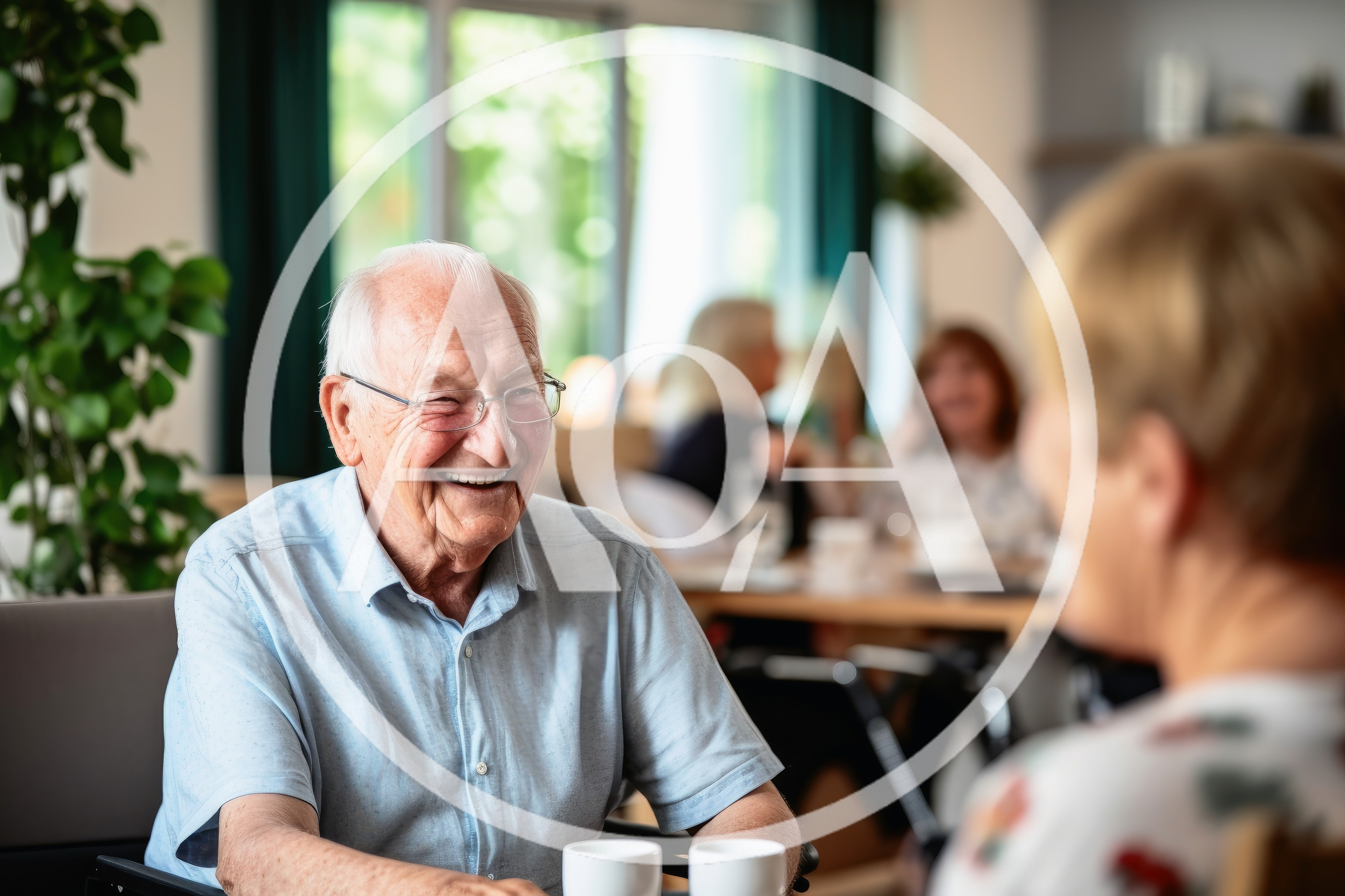 Happy Elderly Man Laughing During Conversation