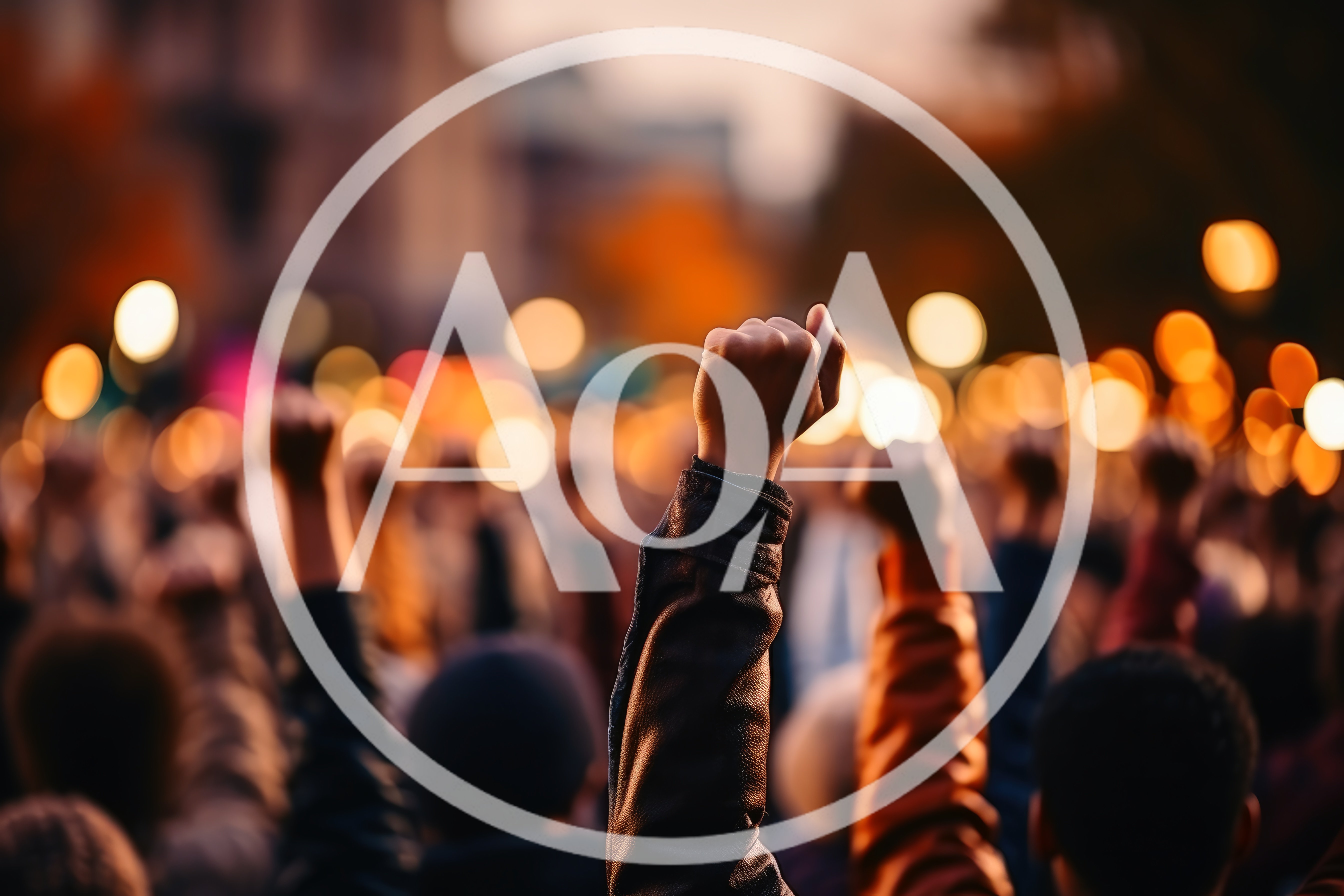 Protesters Raising Fists During A Public Demonstration
