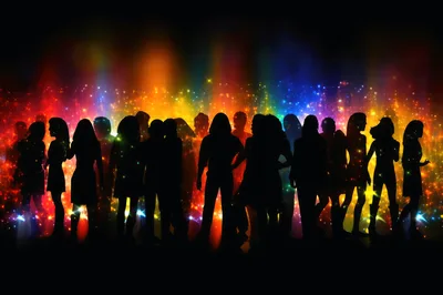 Silhouetted Crowd Dancing Against Vibrant Colorful Light Background