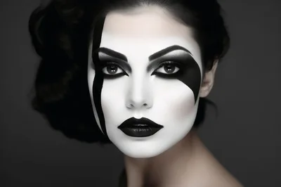Portrait Of A Woman With Dramatic Black And White Makeup