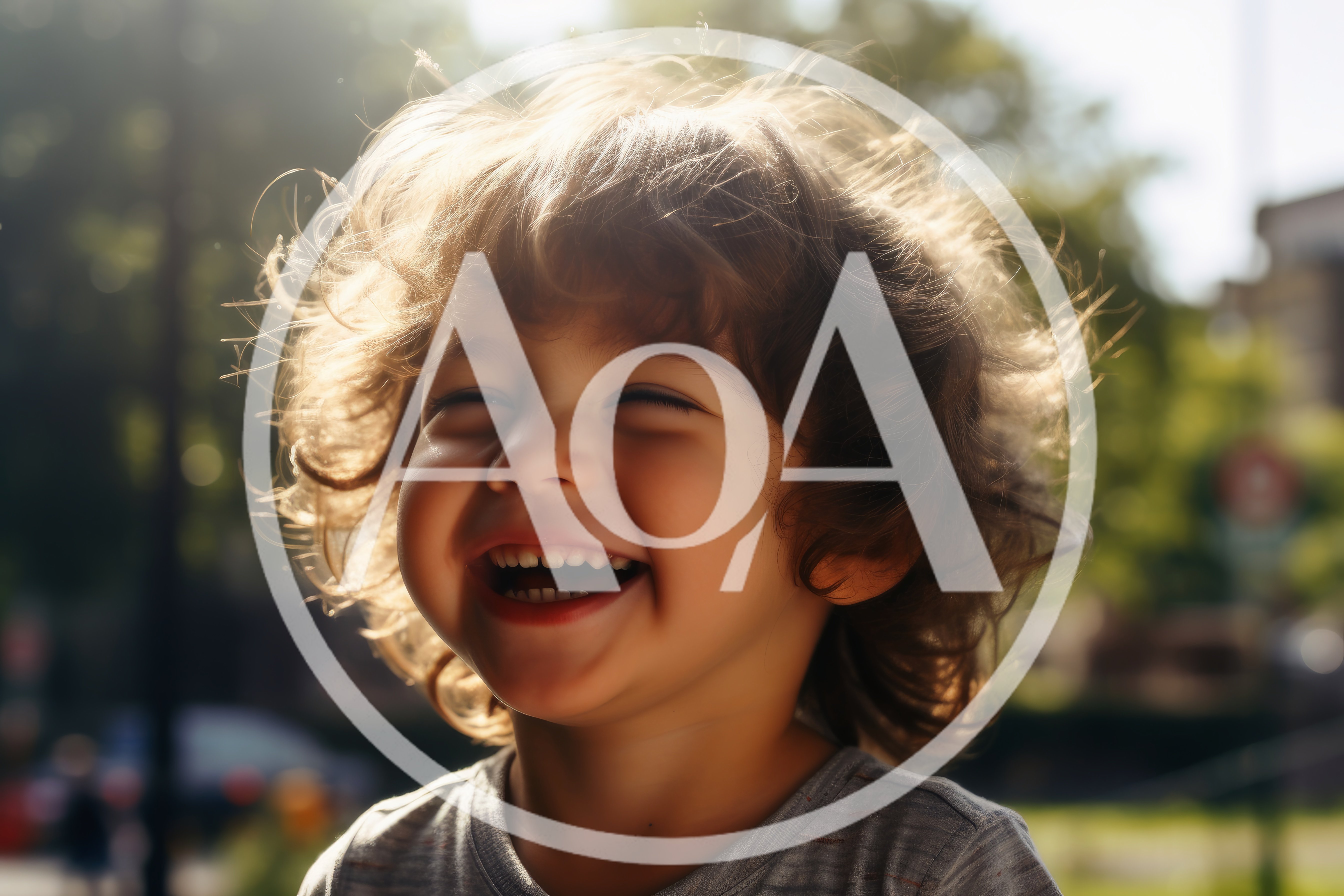 Happy Toddler Laughing Outdoors In Golden Hour Sunlight