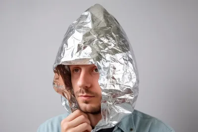 Man Wearing A Homemade Aluminum Foil Hood