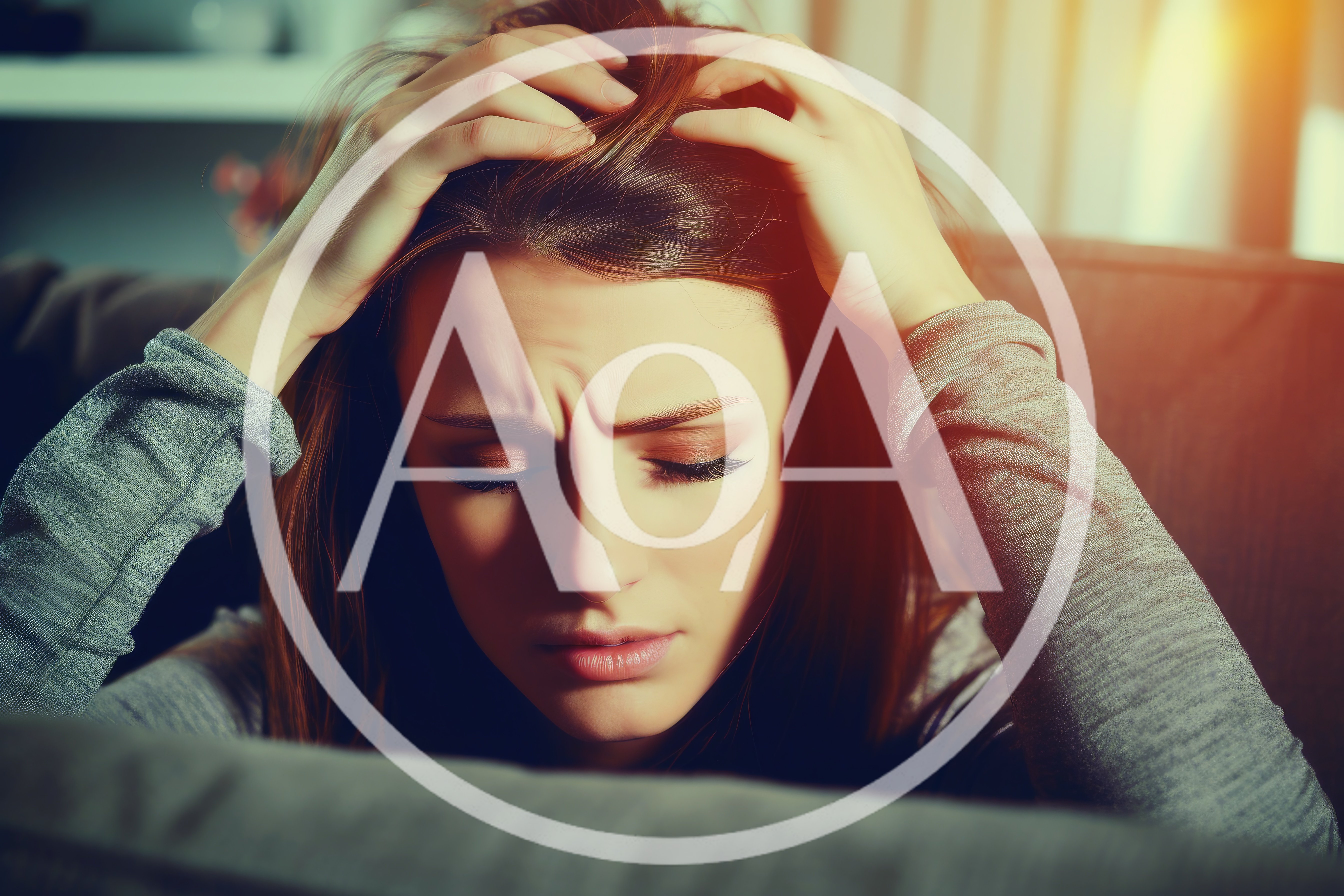 Stressed Young Woman Holding Her Head In Distress