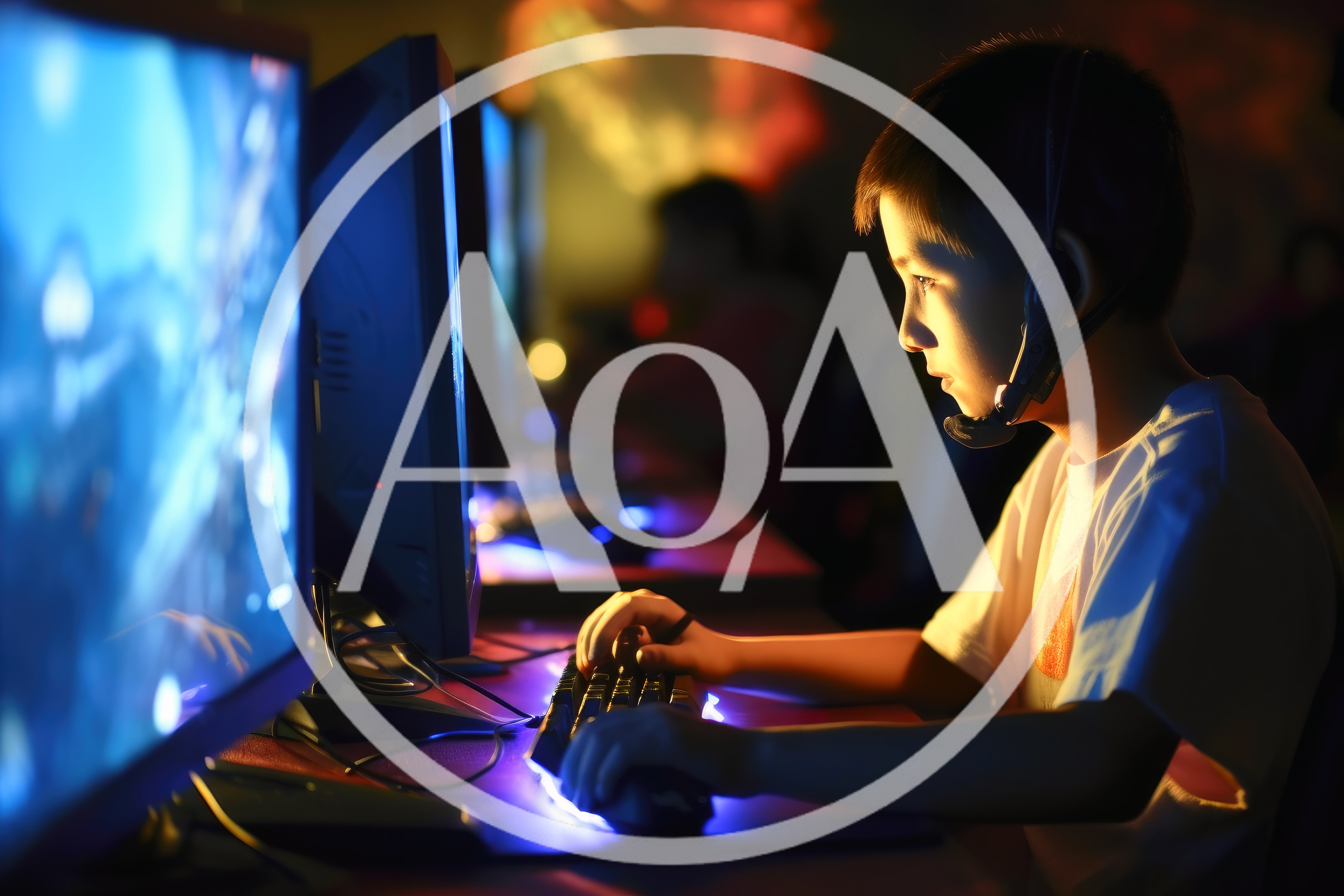 Young Boy Playing Video Games In A Dark Room