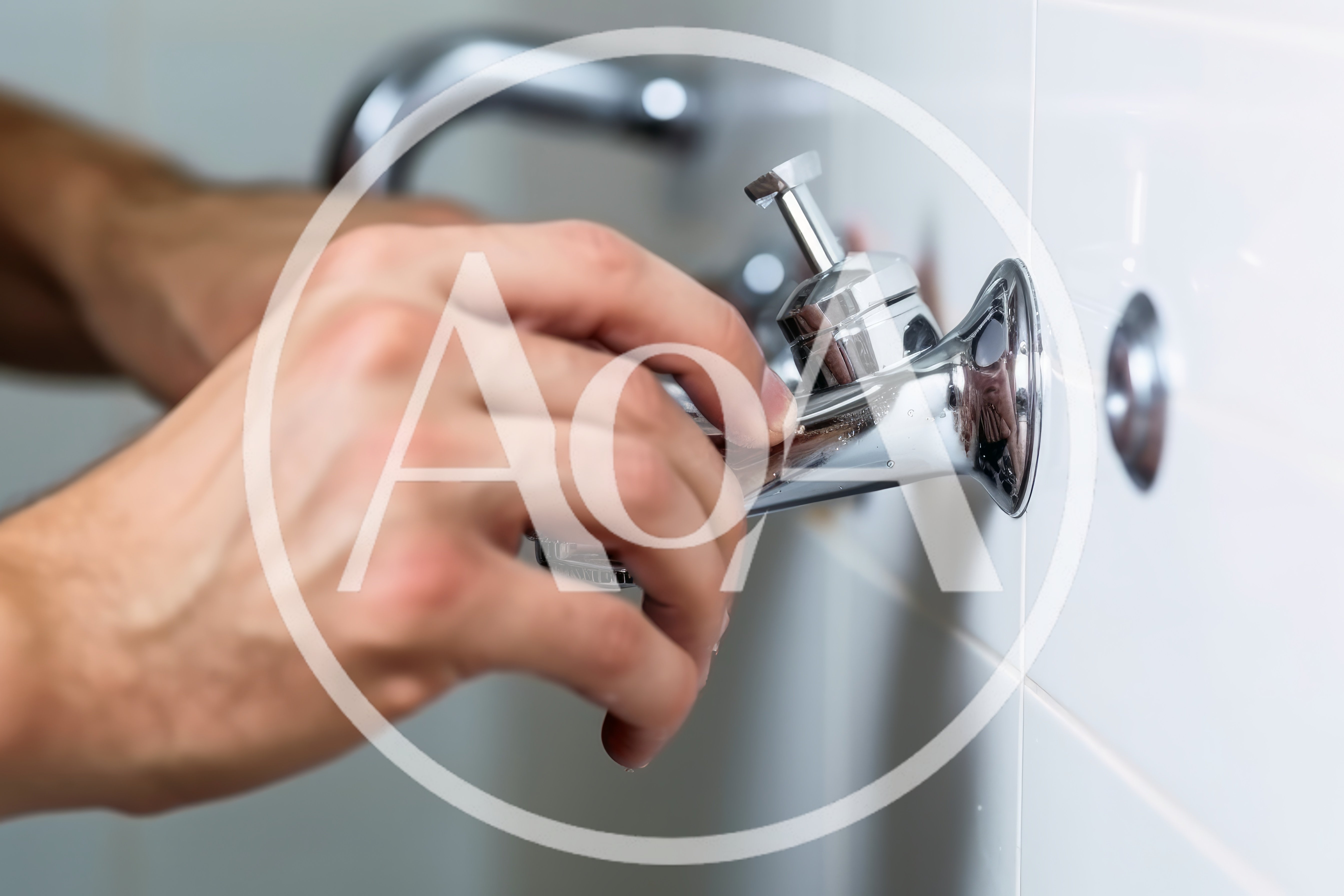 Plumber Installing Or Repairing A Wall Mounted Faucet
