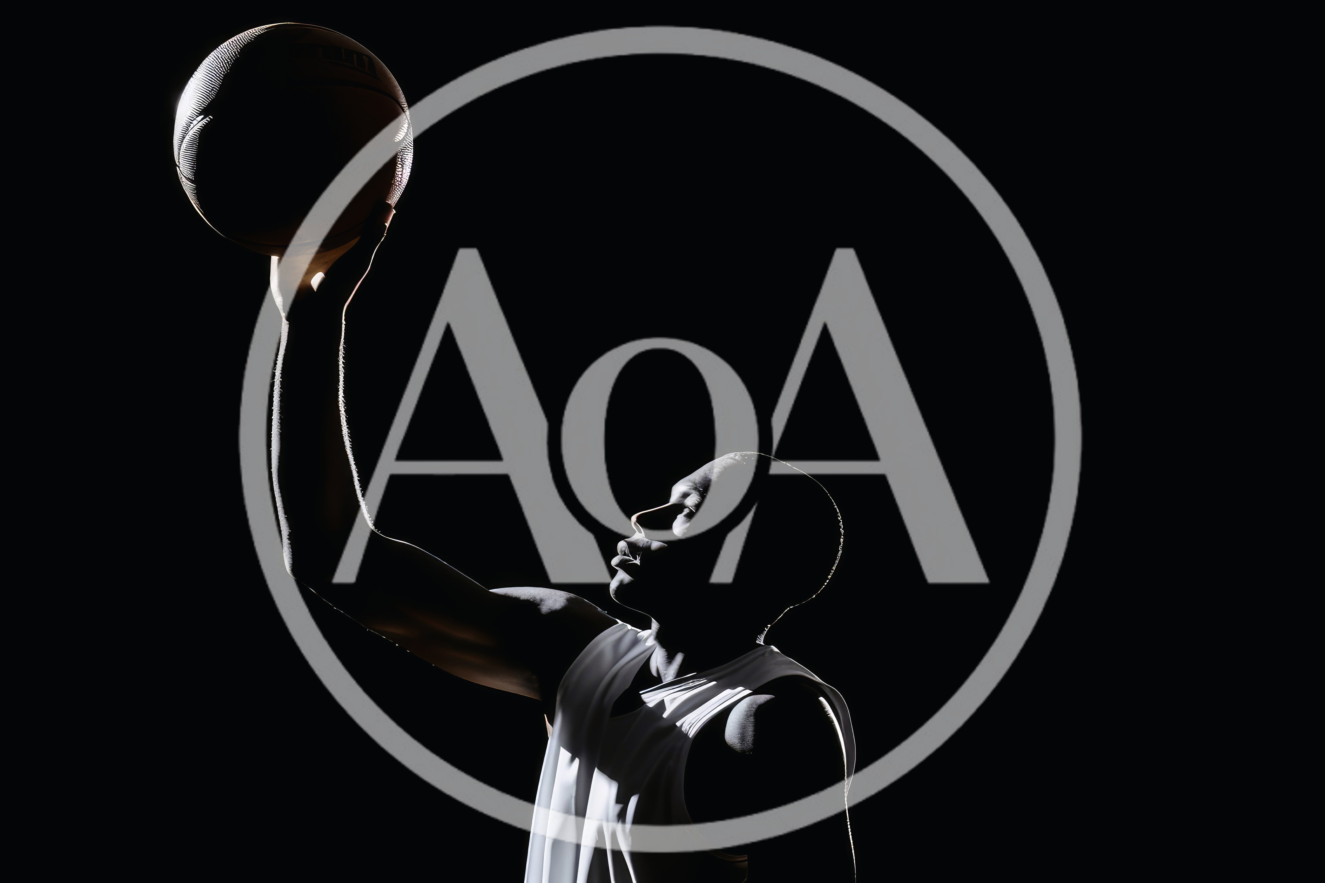 Basketball Player Reaching Up With Ball In Silhouette