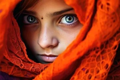 Close Up Portrait Of A Young Girl In Orange Veil
