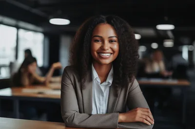 Professional Businesswoman Smiling In A Modern Office Setting
