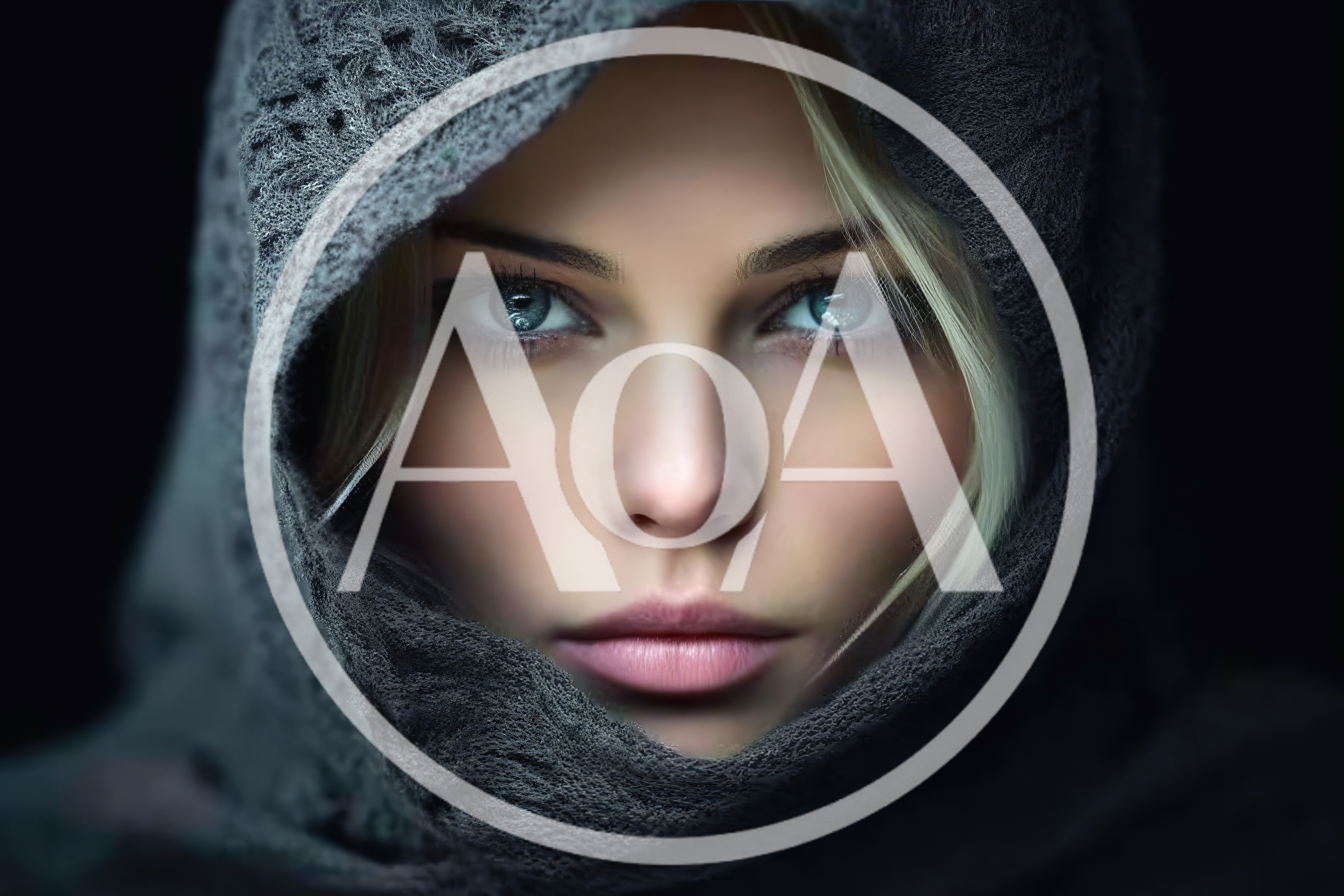 Portrait Of A Young Woman Wearing A Dark Hood