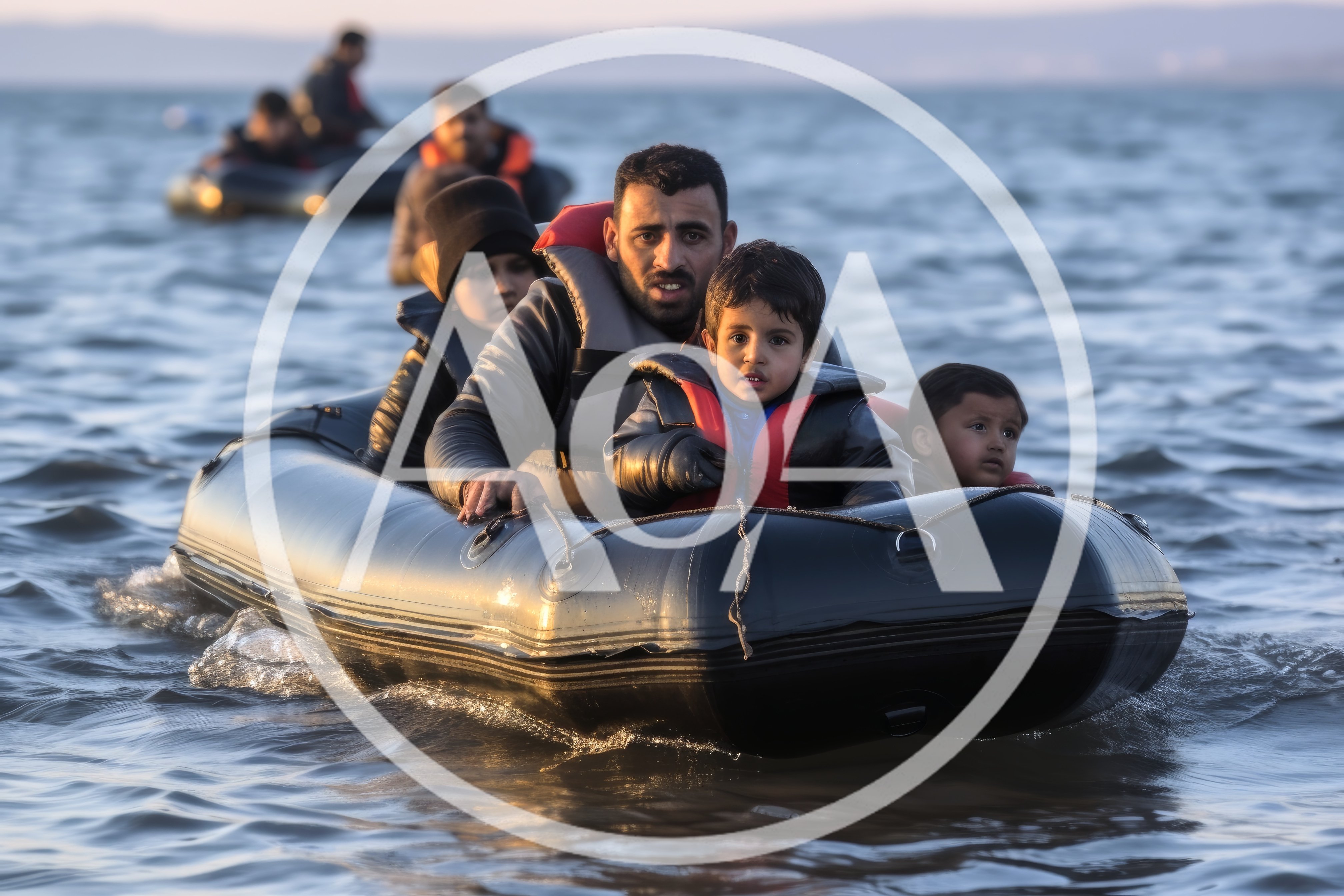 Refugee Family Traveling In An Inflatable Rubber Boat