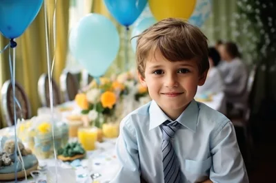 Young Boy Wearing A Tie At A Birthday Party