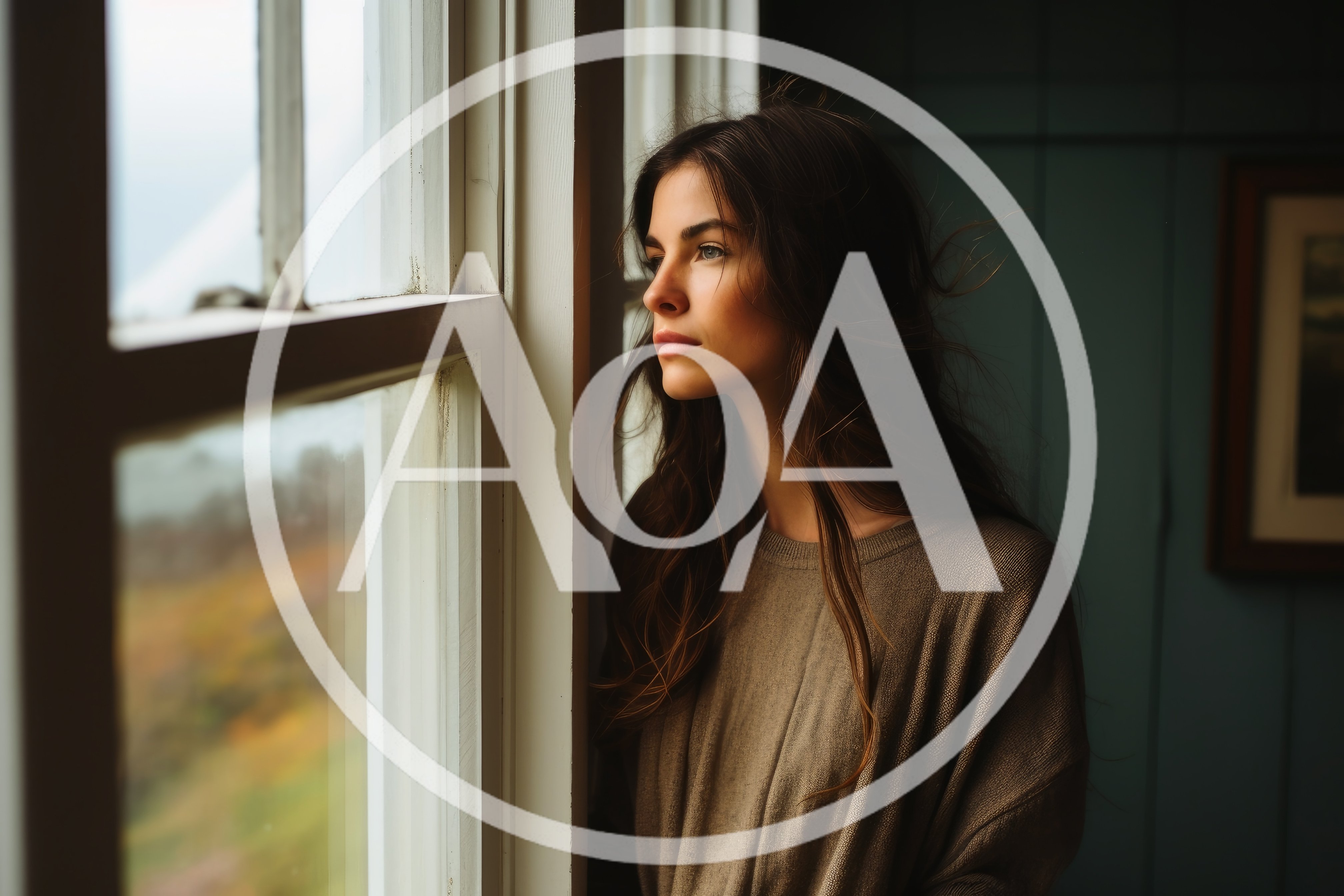Pensive Young Woman Looking Out A Window