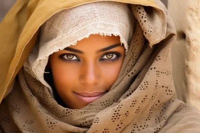 Portrait Of A Young Woman Wearing A Traditional Headscarf