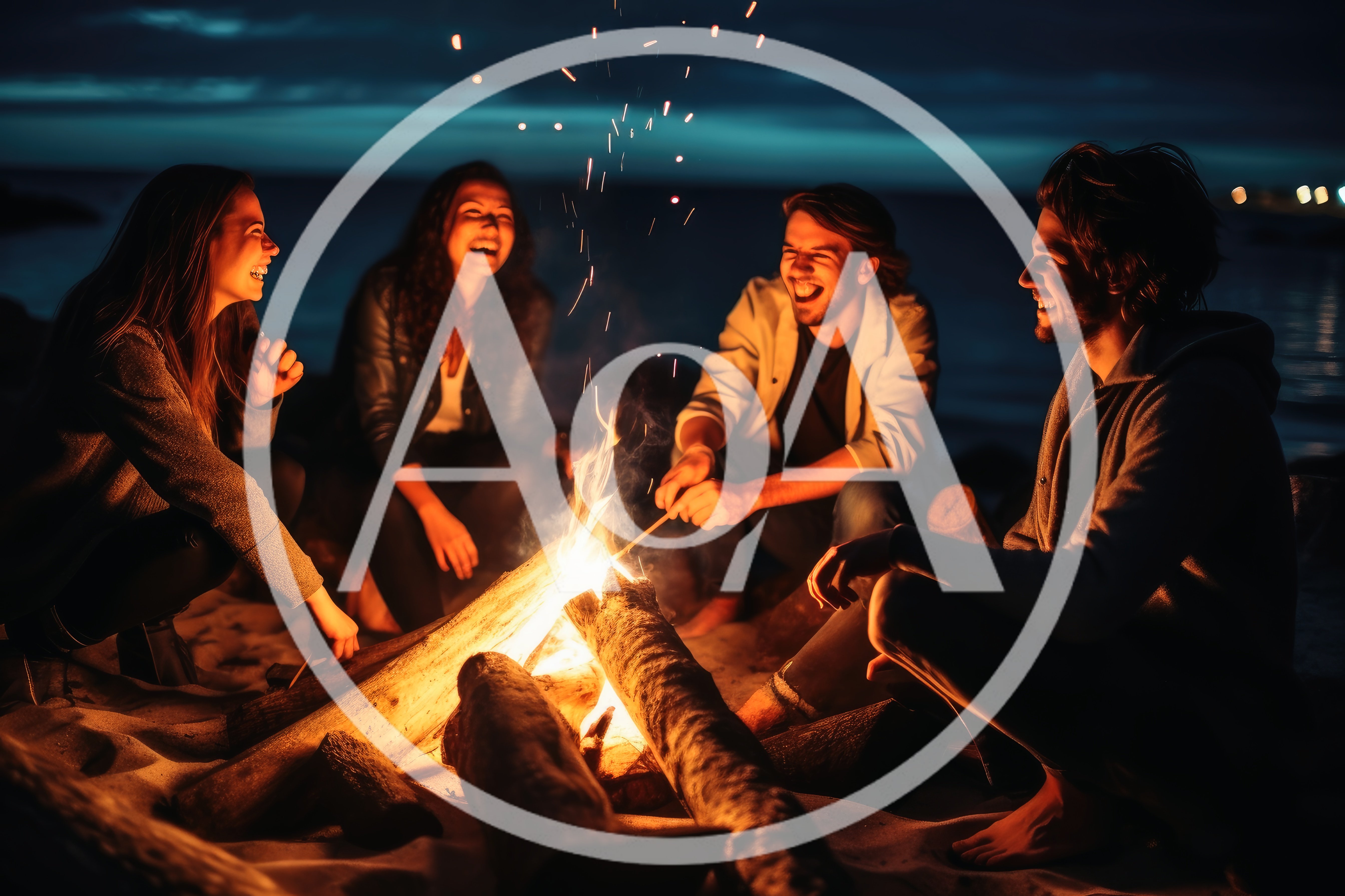 Friends Laughing Around A Beach Bonfire At Night