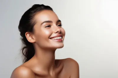 Portrait Of A Smiling Woman With Radiant Skin