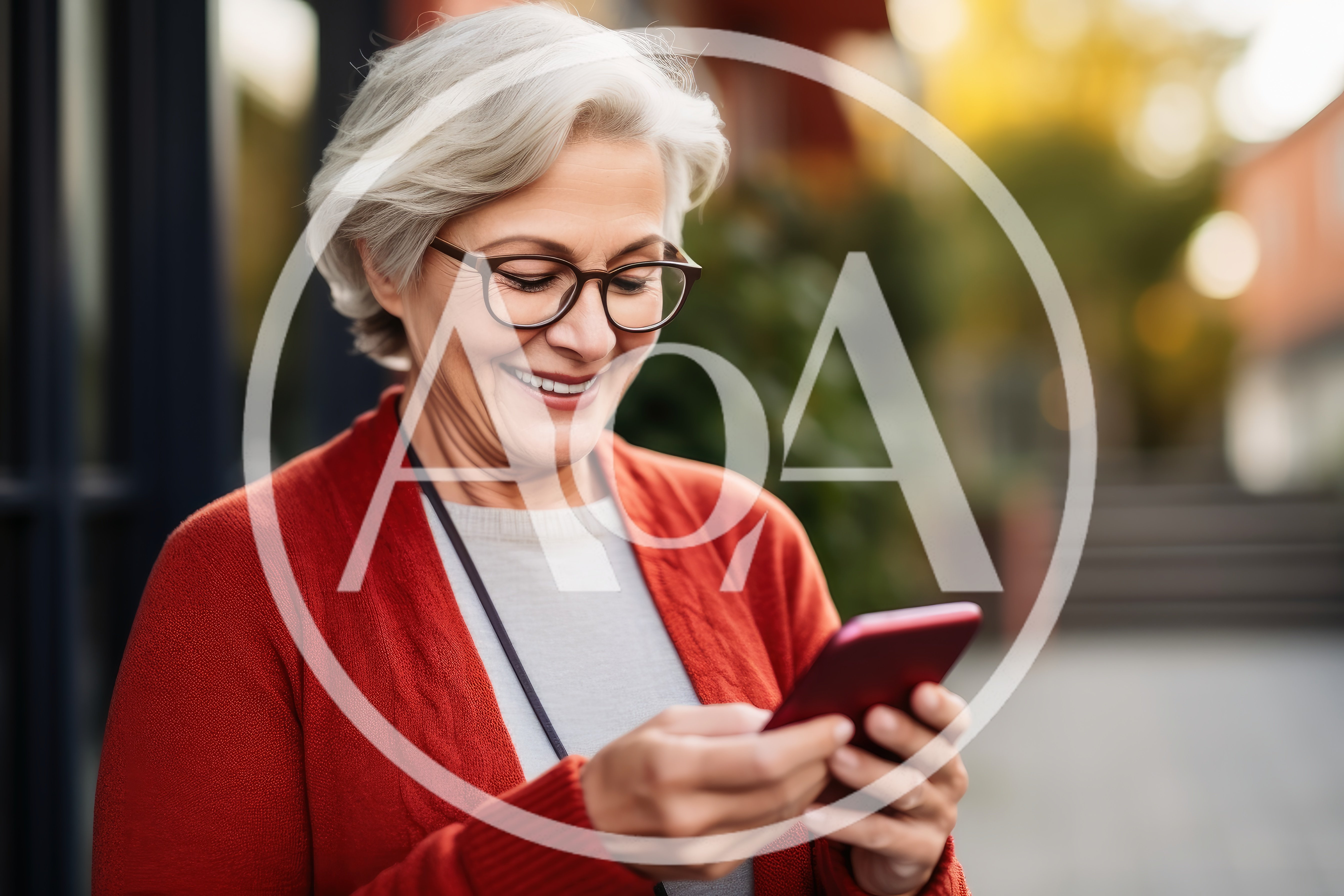 Senior Woman Using Smartphone Outdoors