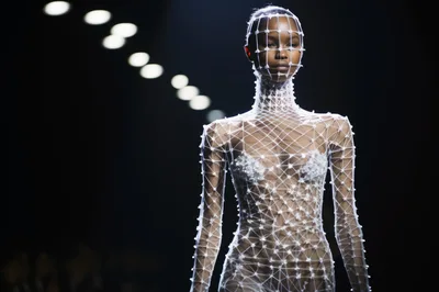Model Wearing Avant Garde Geometric Mesh Fashion Design