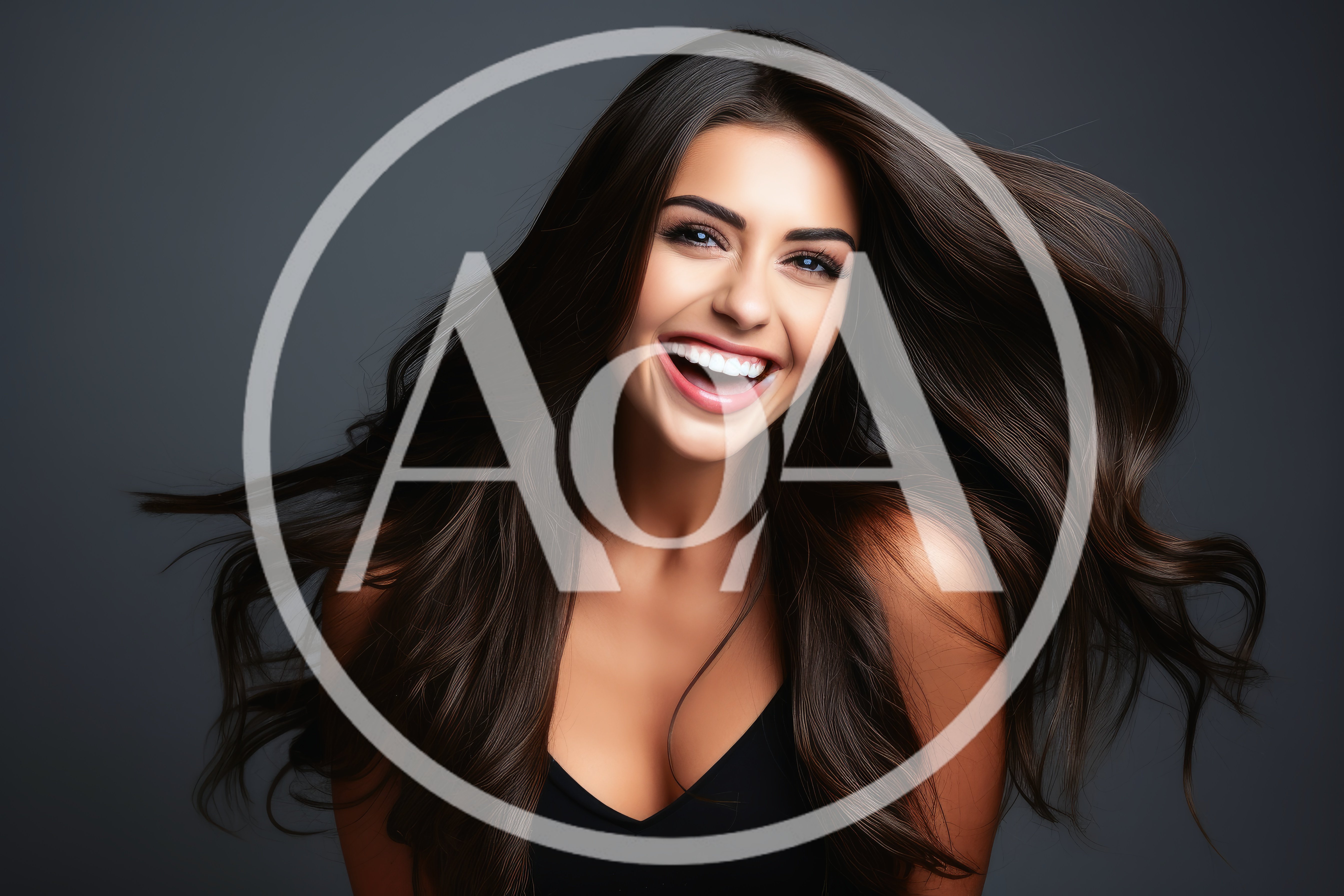 Portrait Of A Smiling Woman With Flowing Dark Hair