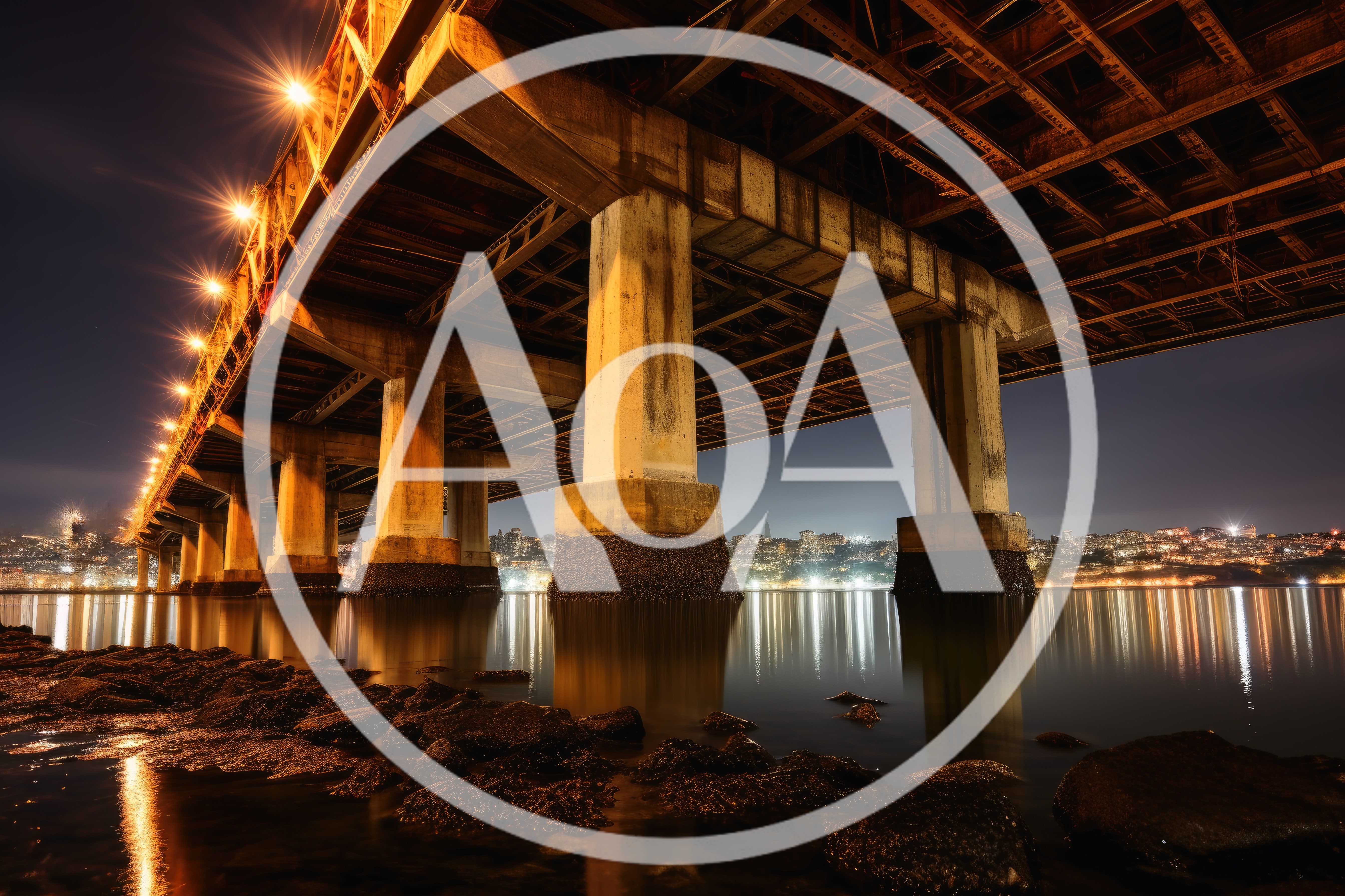 Night View Underneath A Large Steel Bridge