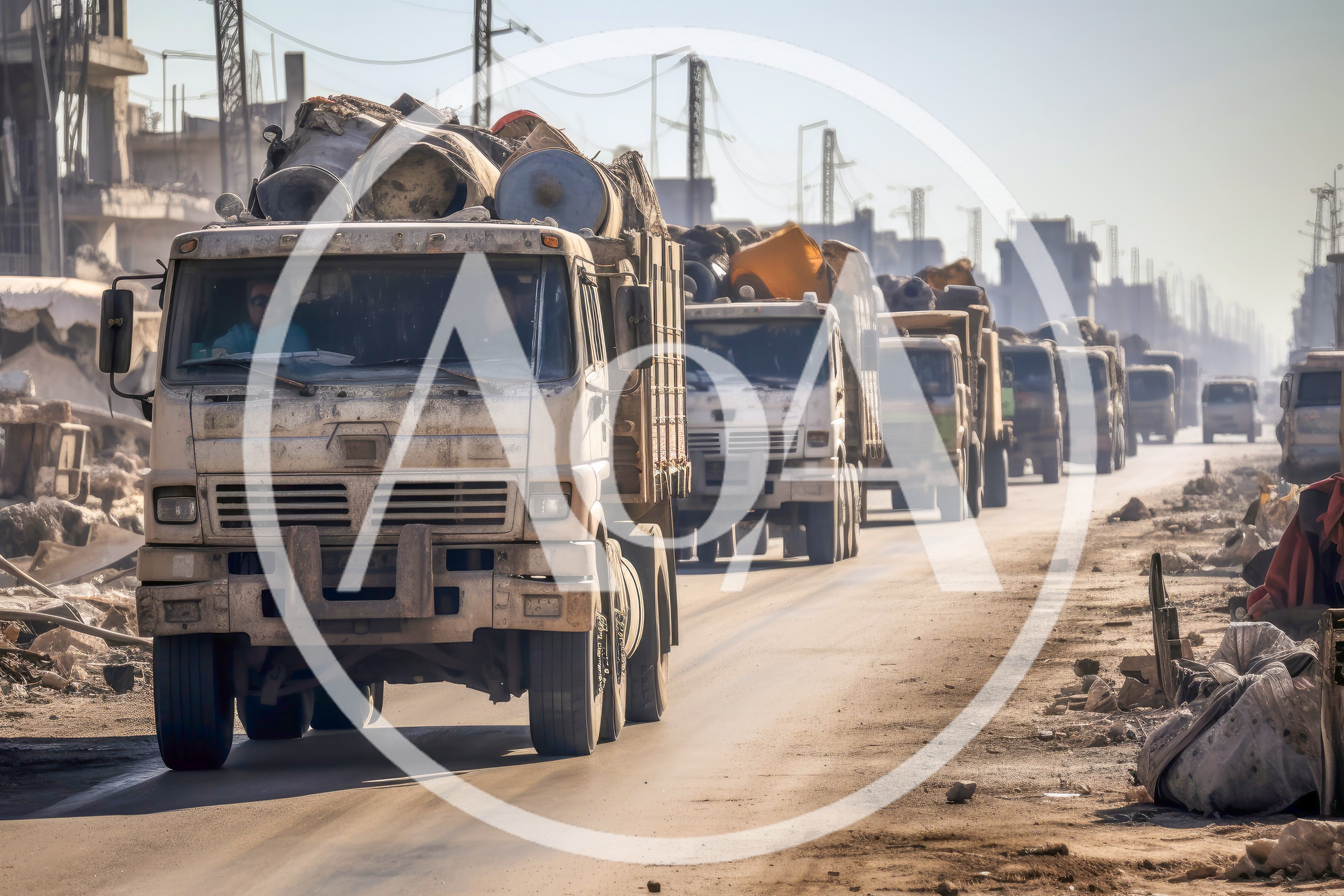 Convoy Of Loaded Trucks Driving On Dusty Road