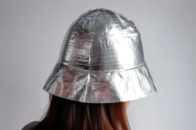 Person Wearing A Homemade Aluminum Foil Hat