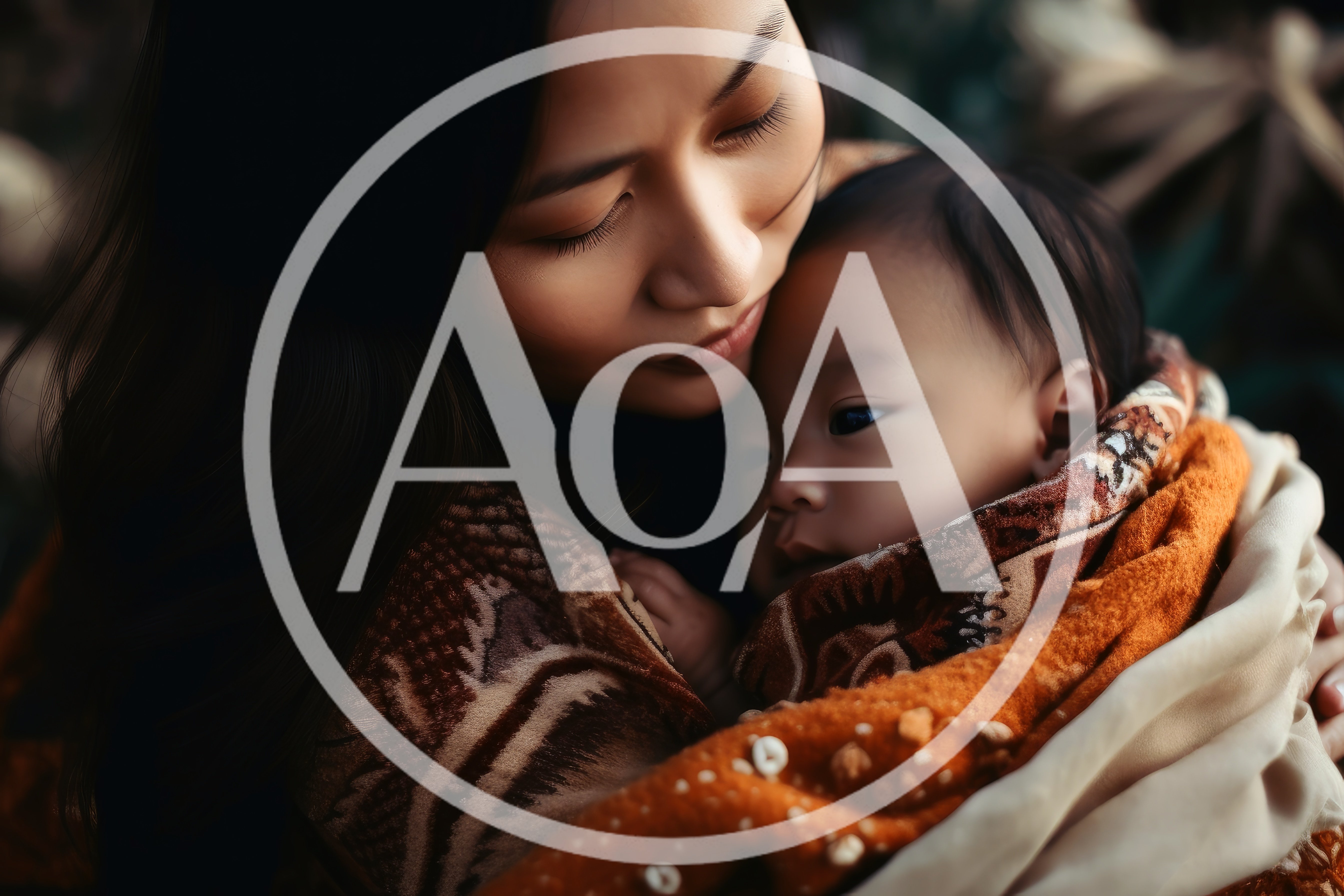 Tender Mother Holding Her Newborn Baby In Blanket