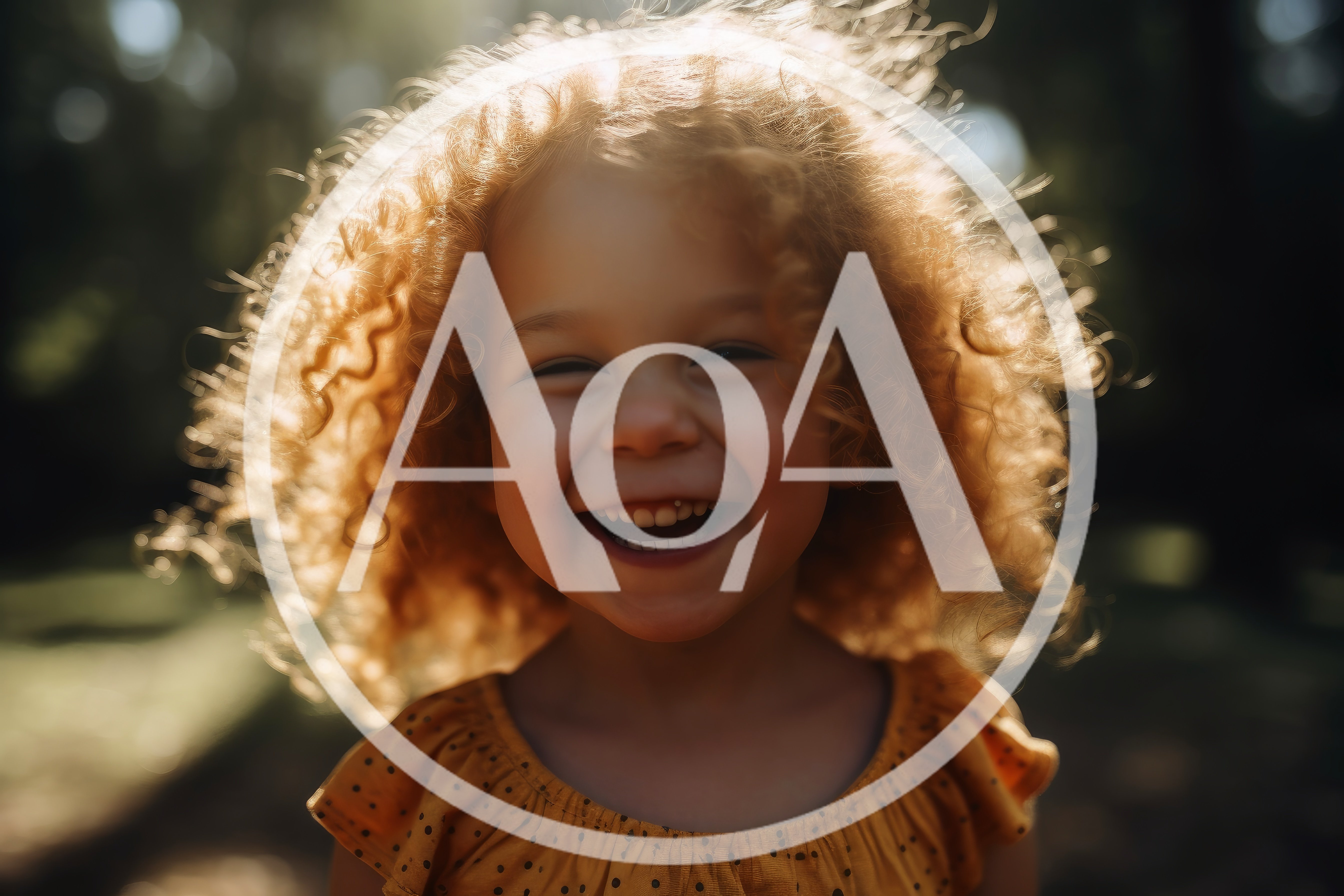 Happy Toddler Girl With Curly Hair Laughing Outdoors