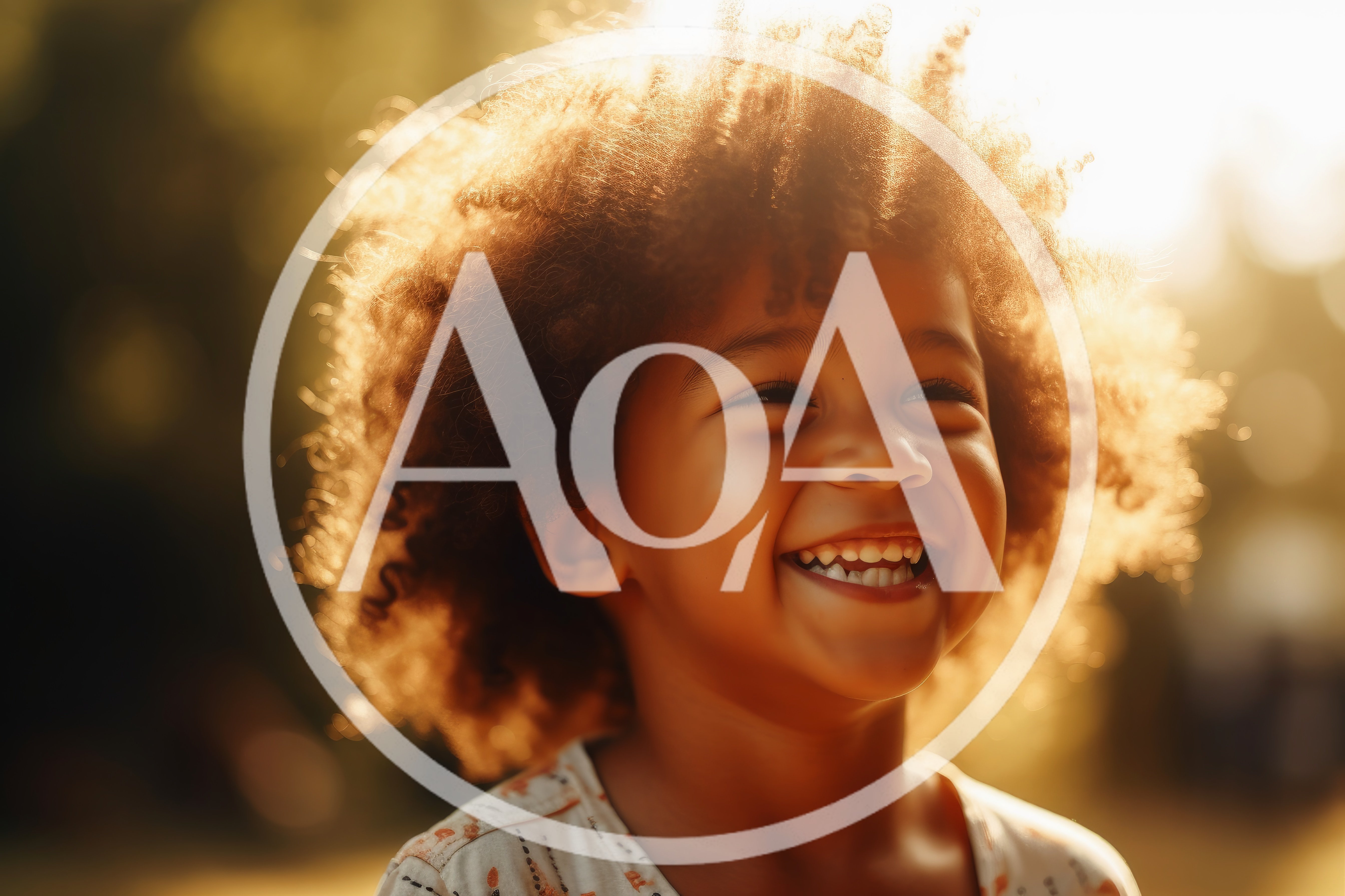 Happy Young Child With Curly Hair Smiling Outdoors
