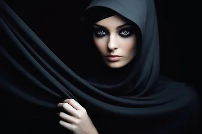 Portrait Of A Mysterious Woman In A Black Hood