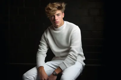 Portrait Of A Stylish Young Man In White Sweater