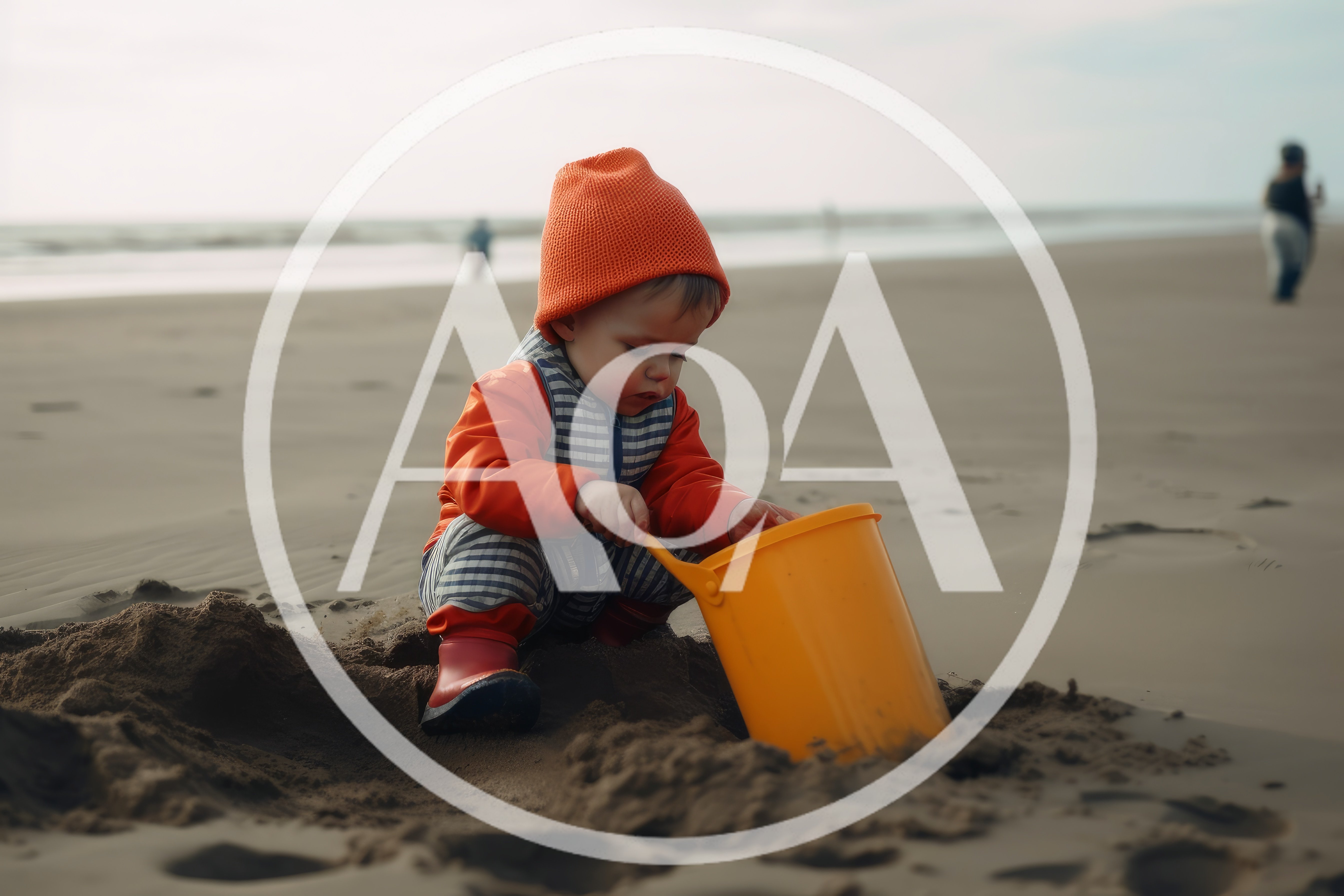 Toddler Playing With A Bucket On A Sandy Beach