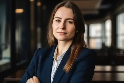 Professional Businesswoman Posing In A Modern Office Setting