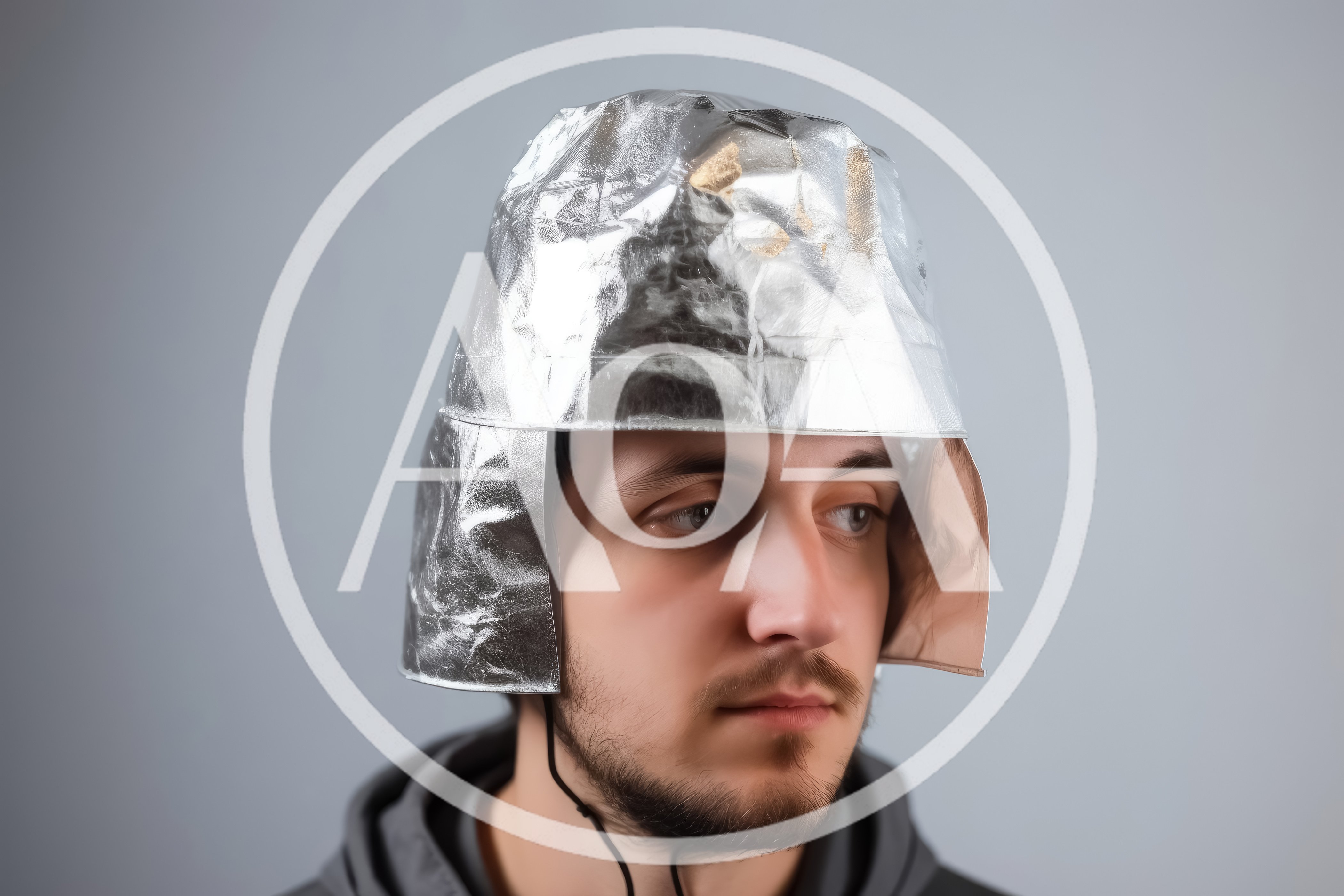 Young Man Wearing A Homemade Tin Foil Helmet
