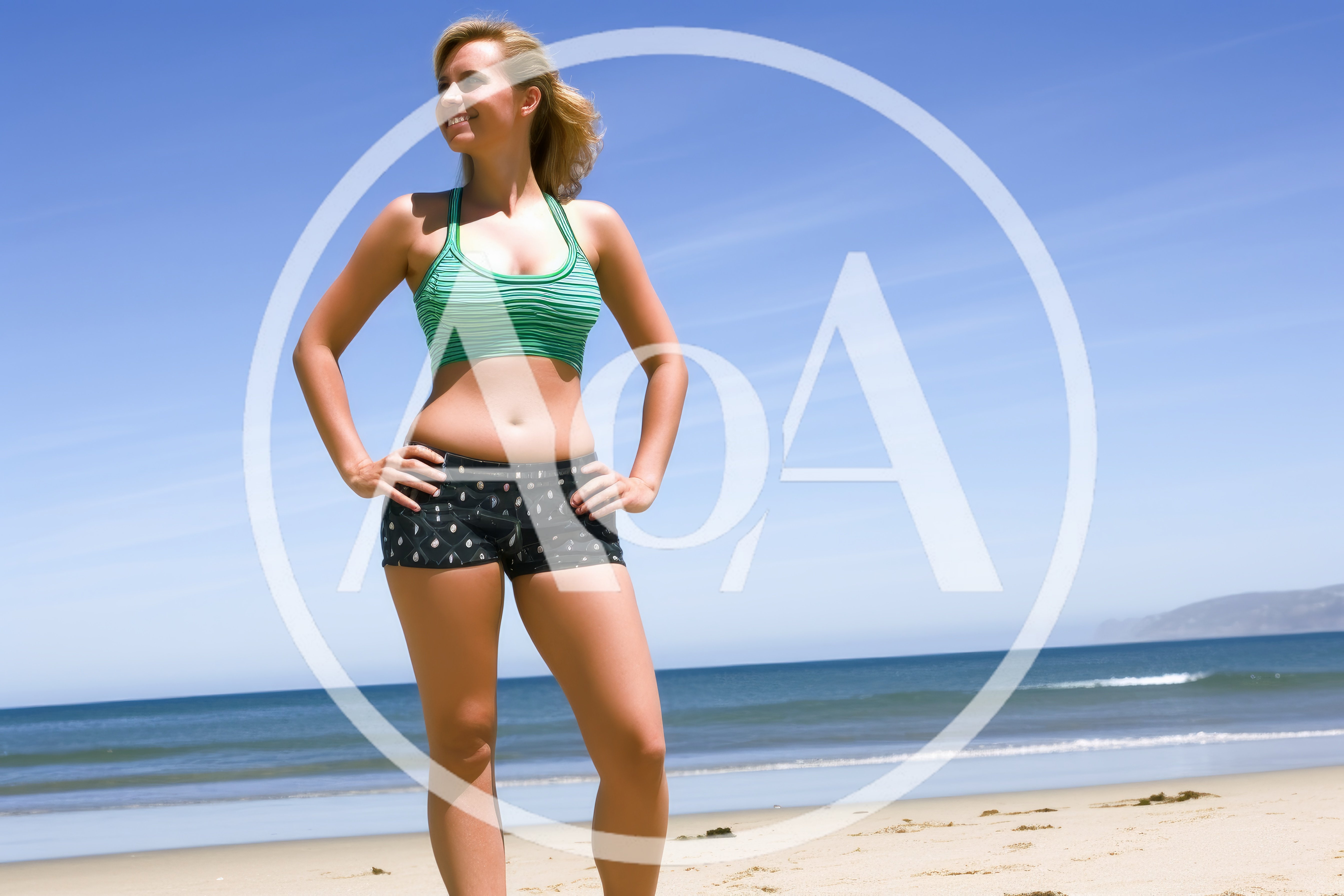 Fit Woman Standing On A Sunny Beach