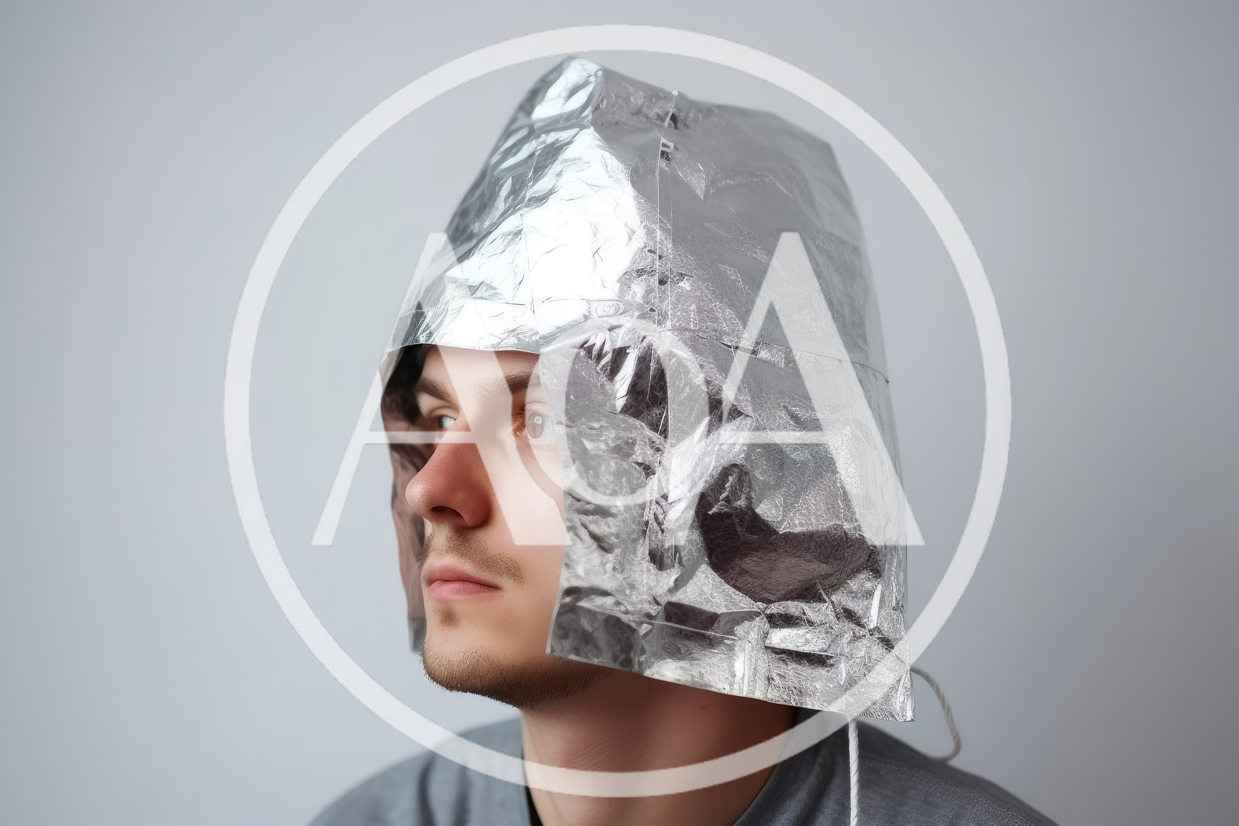 Man Wearing A Homemade Aluminum Foil Hat