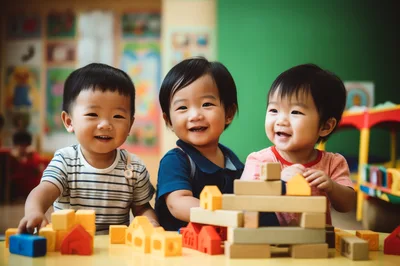 Three Toddlers Playing With Wooden Building Blocks