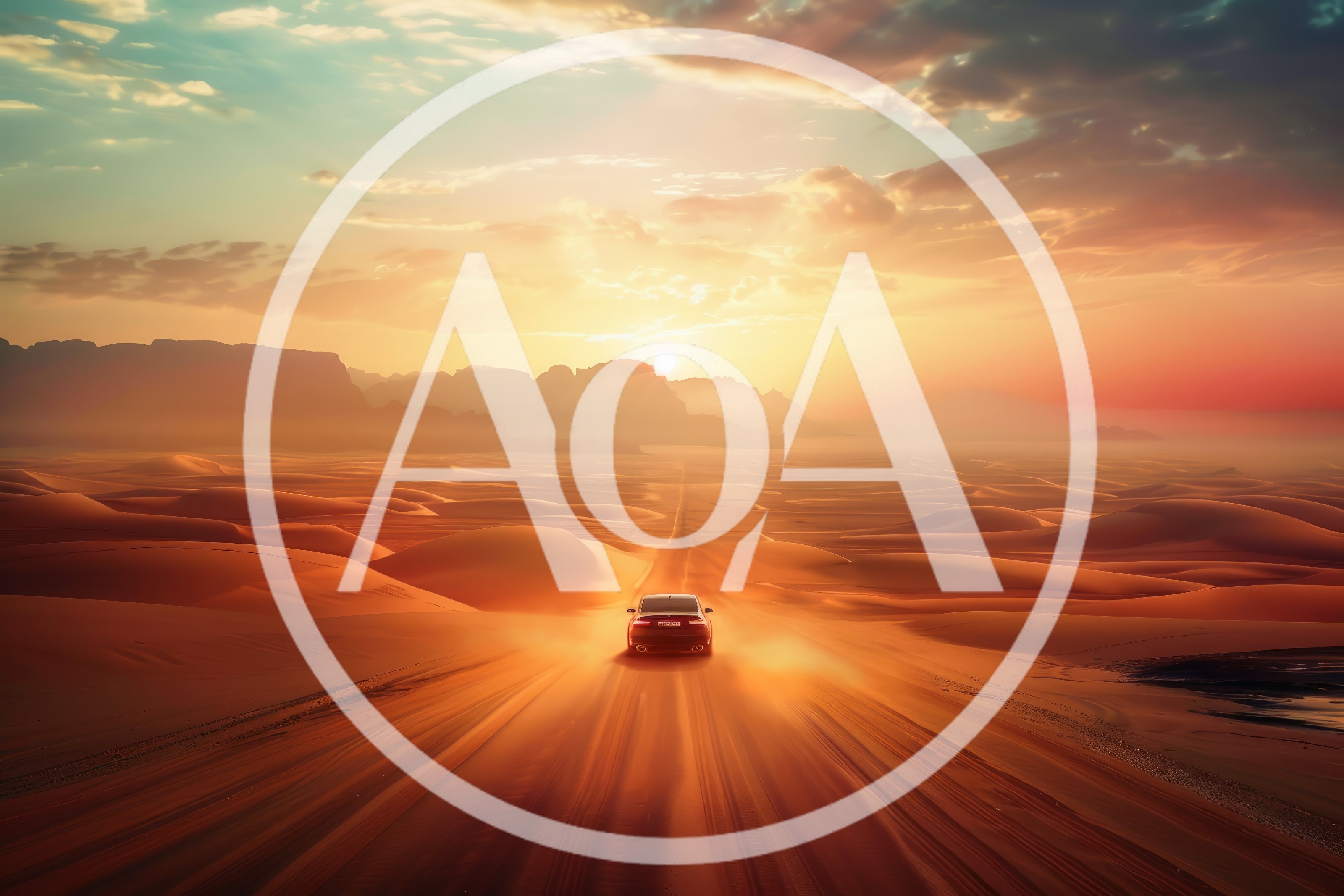 Luxury Sedan Driving Through Vast Desert Landscape